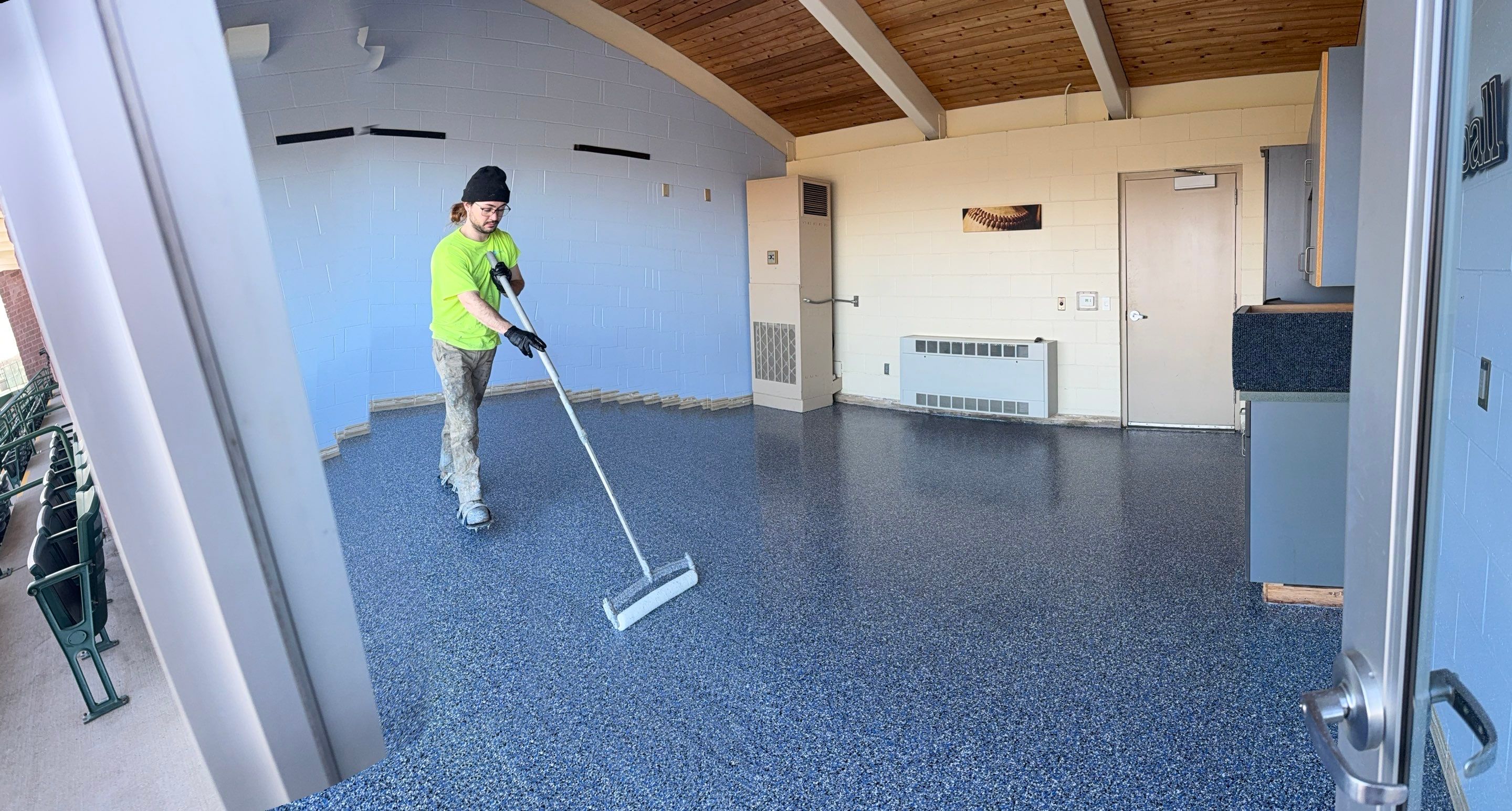 Commercial Epoxy Floor Coating for Stadium Viewing Suites in Sioux Falls by Select Painting, Coatings & Garage Cabinets