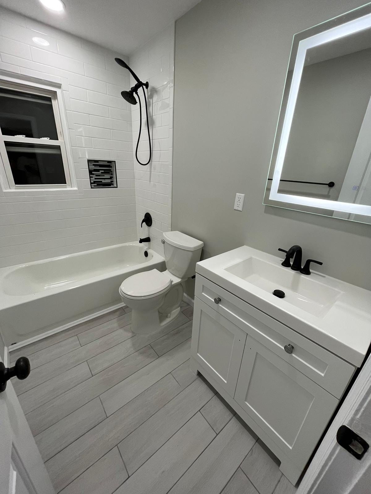 Bathroom Remodel using Tile by Home Concepts Construction