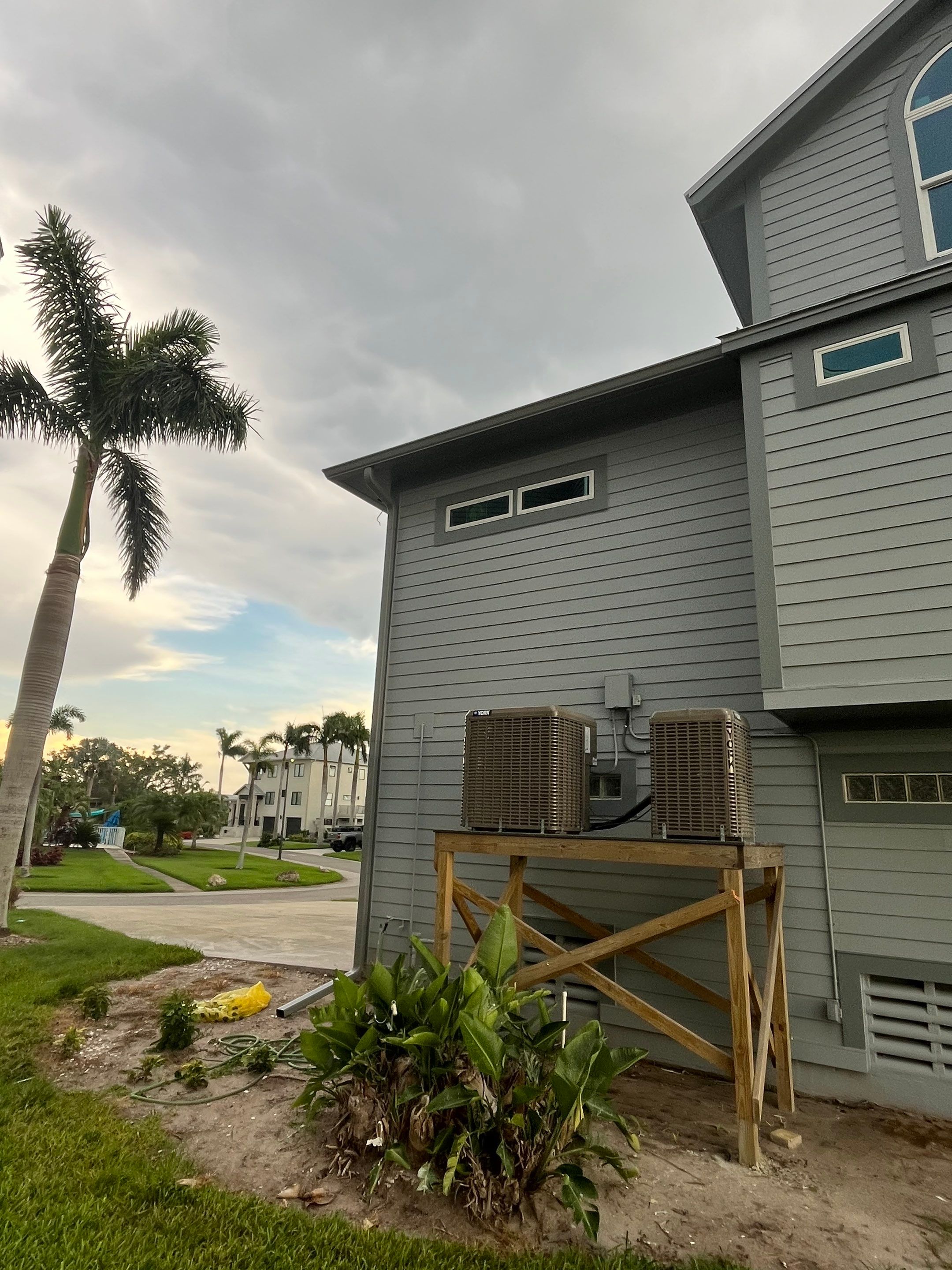 Downspout Installation Dove Grey Palmetto FL by Gutter Professors