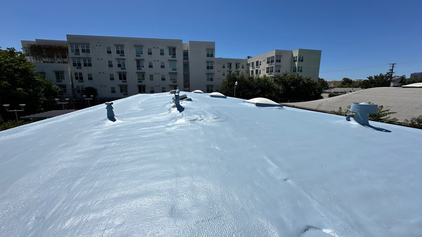 Foam Refurbish using Conklin Benchmark/PUMA XL coatings and spray foam by Straight Edge Roofing Inc