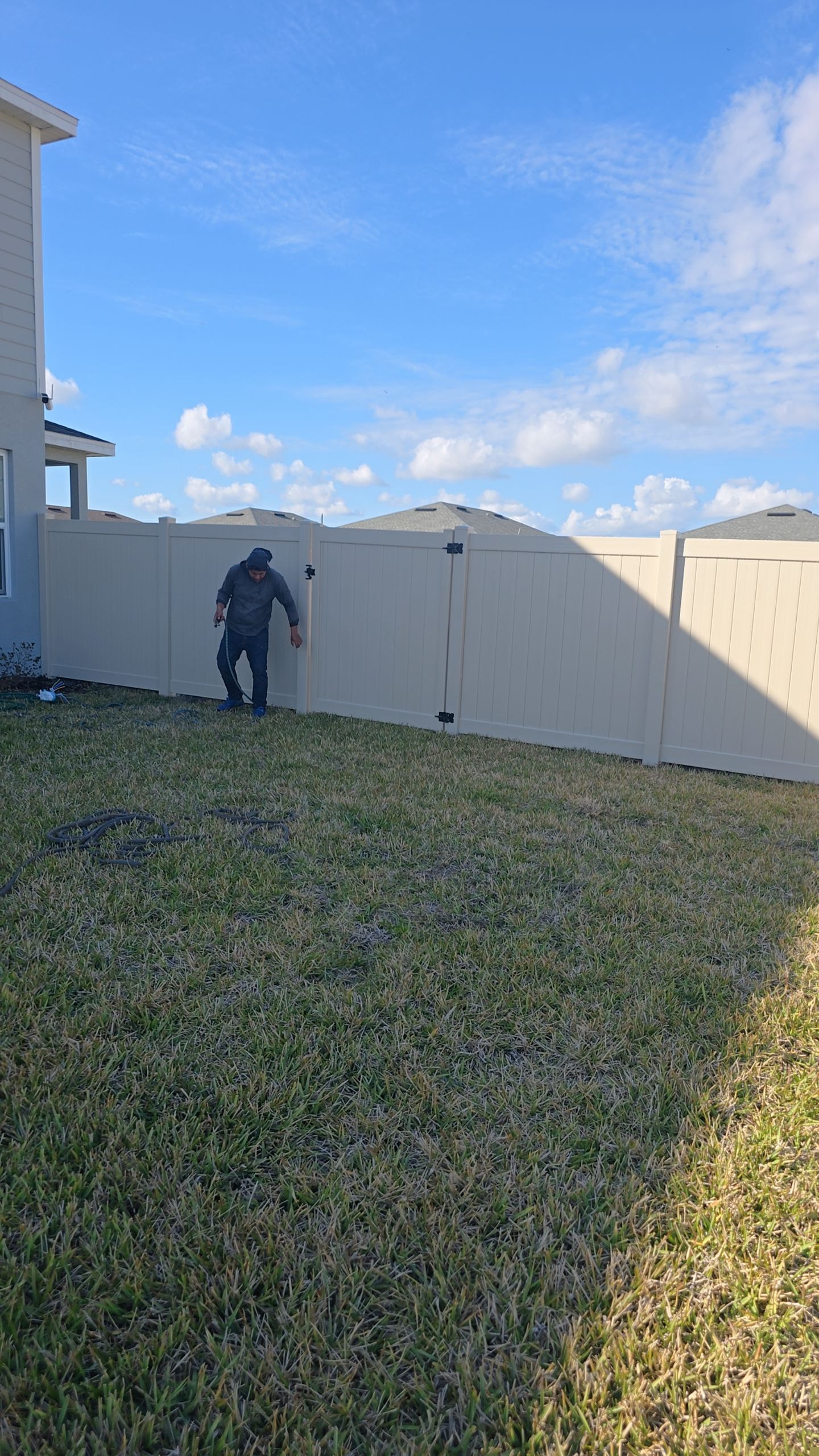 Tan Vinyl Fence in West Port by True Fence LLC
