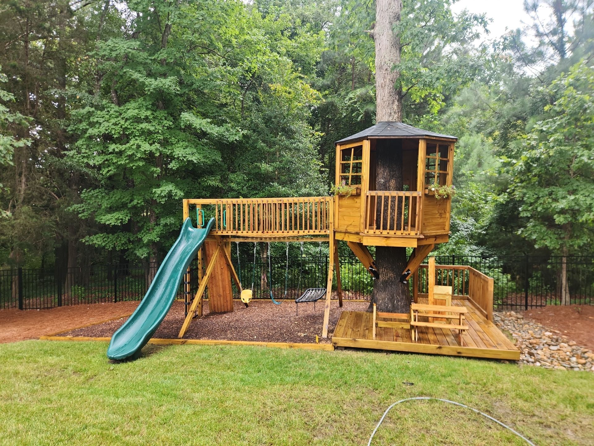 Concrete Driveway, Wood Playset using Wood Sealant and Concrete Sealant by DuraSeal