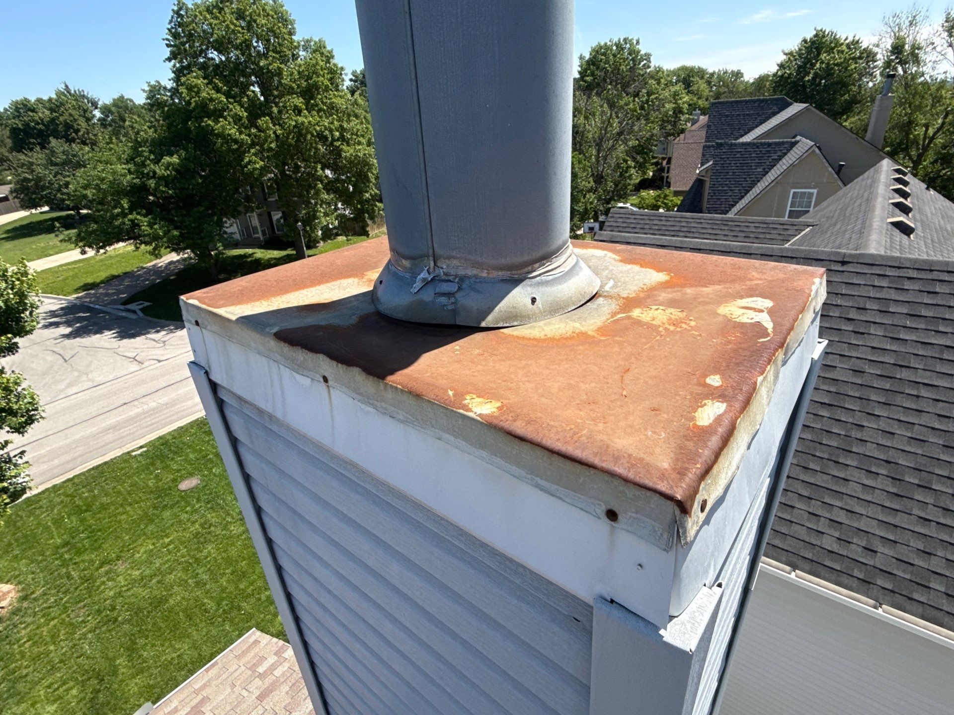 Vinyl Siding and Chimney Flashing Repair in Shawnee by Summit Roofing