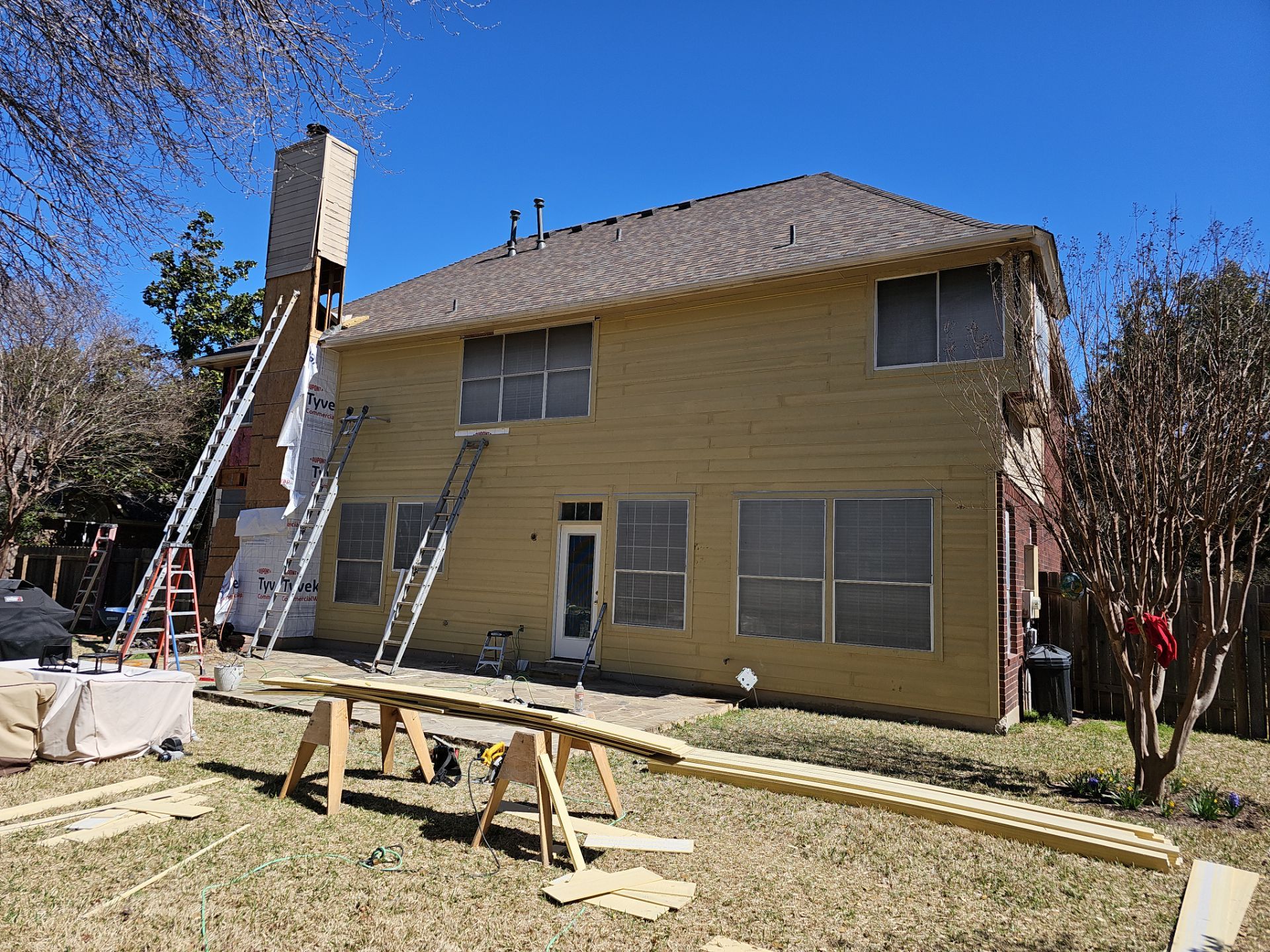 New Hardie Lap Siding & Board and Batten by DeZign Roofing & Exteriors