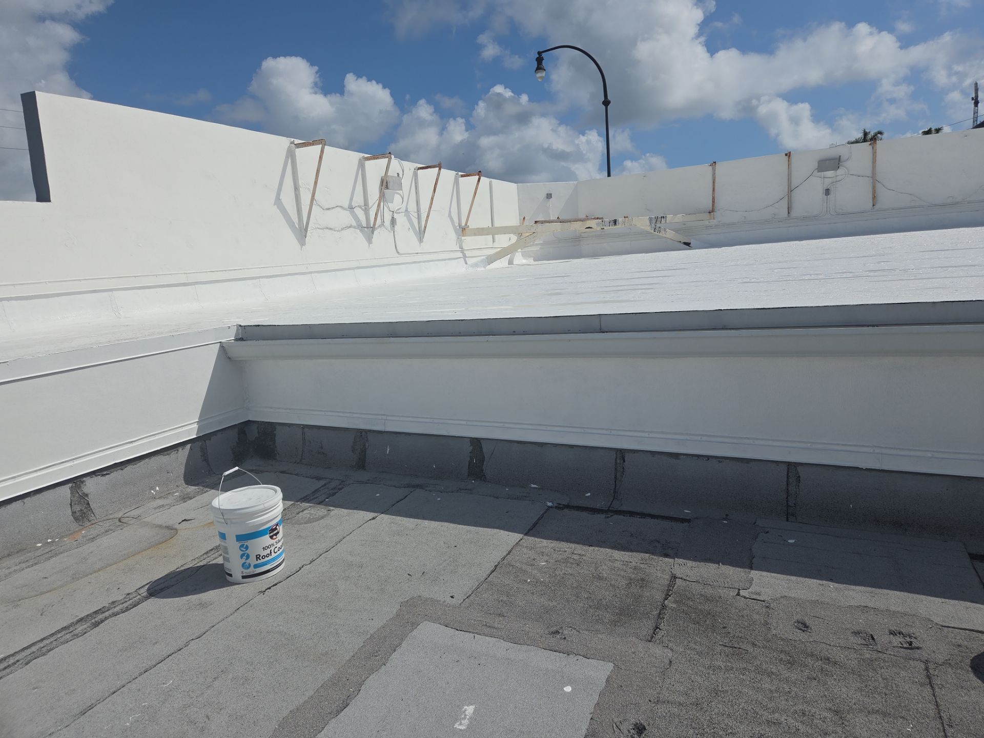 Commercial Flat Roof Restoration Using Silicone Coating in Hallandale Beach by Aastro Roofing