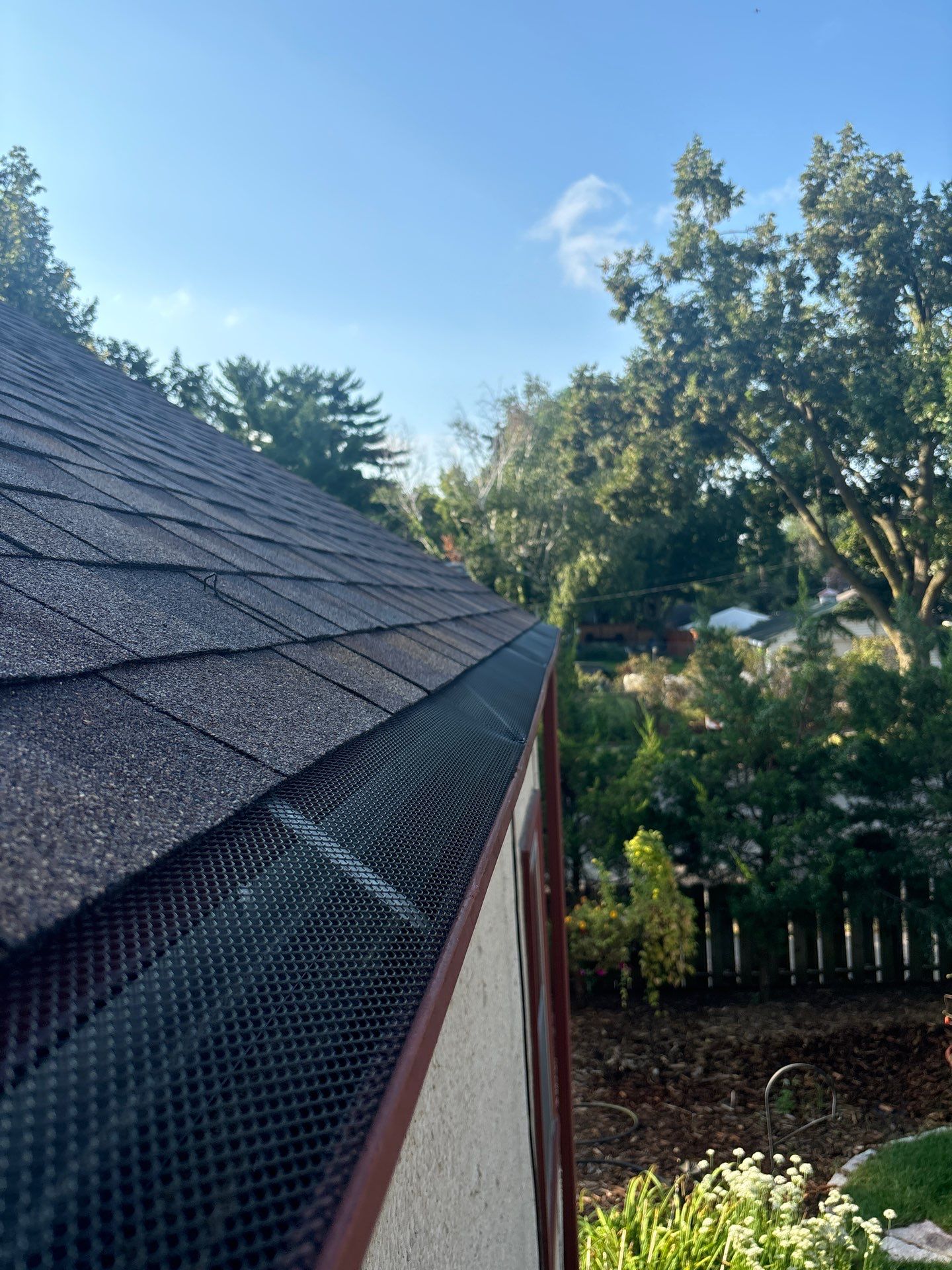Black Mesh Gutter Guard Installation in Minneapolis, MN by Next Level Seamless Gutters / Exteriors Inc.