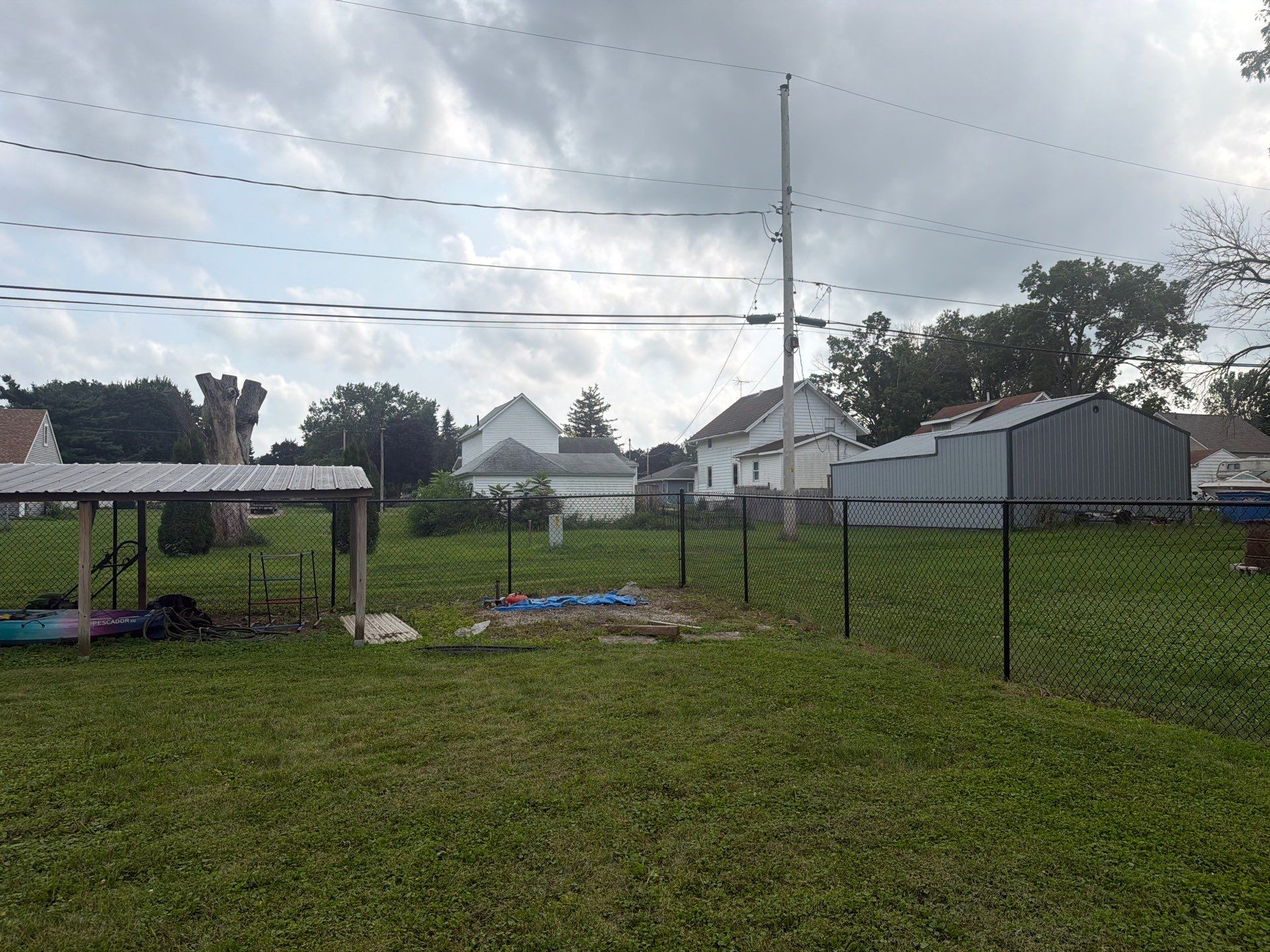 Residential Black Chain Link Fence Installation in Reinbeck by Perfect Picket Fence and Stain