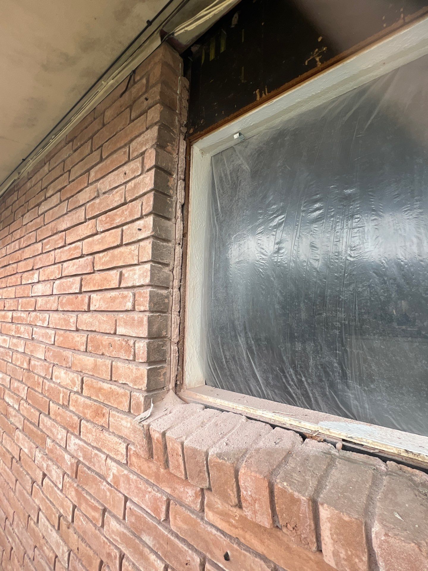 Windows in Brick with a Bay Window by Bayfront Roofing and Construction