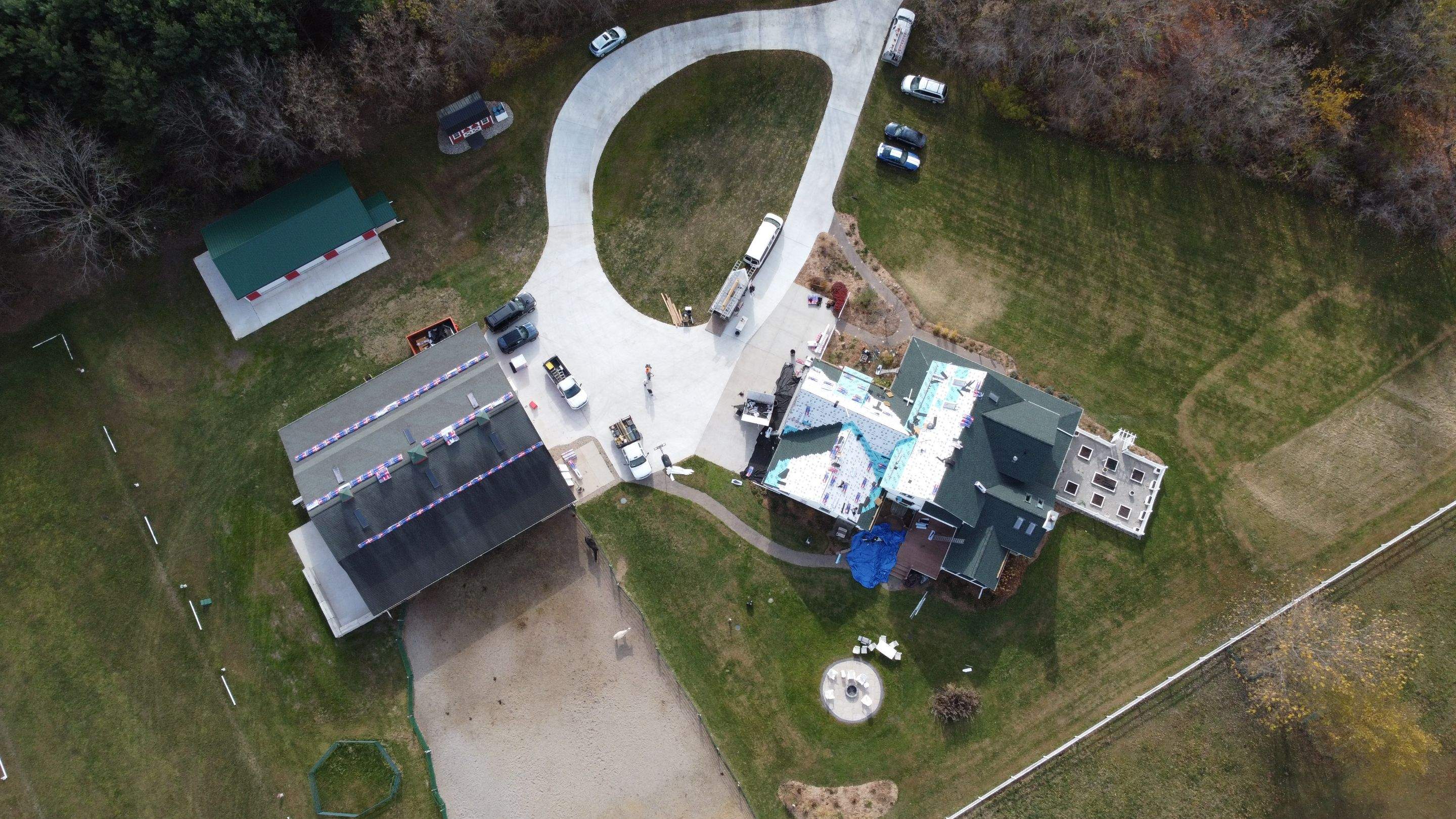 Residential Roofing Replacement with Multiple Skylights in Mason, Michigan by Acme Exteriors