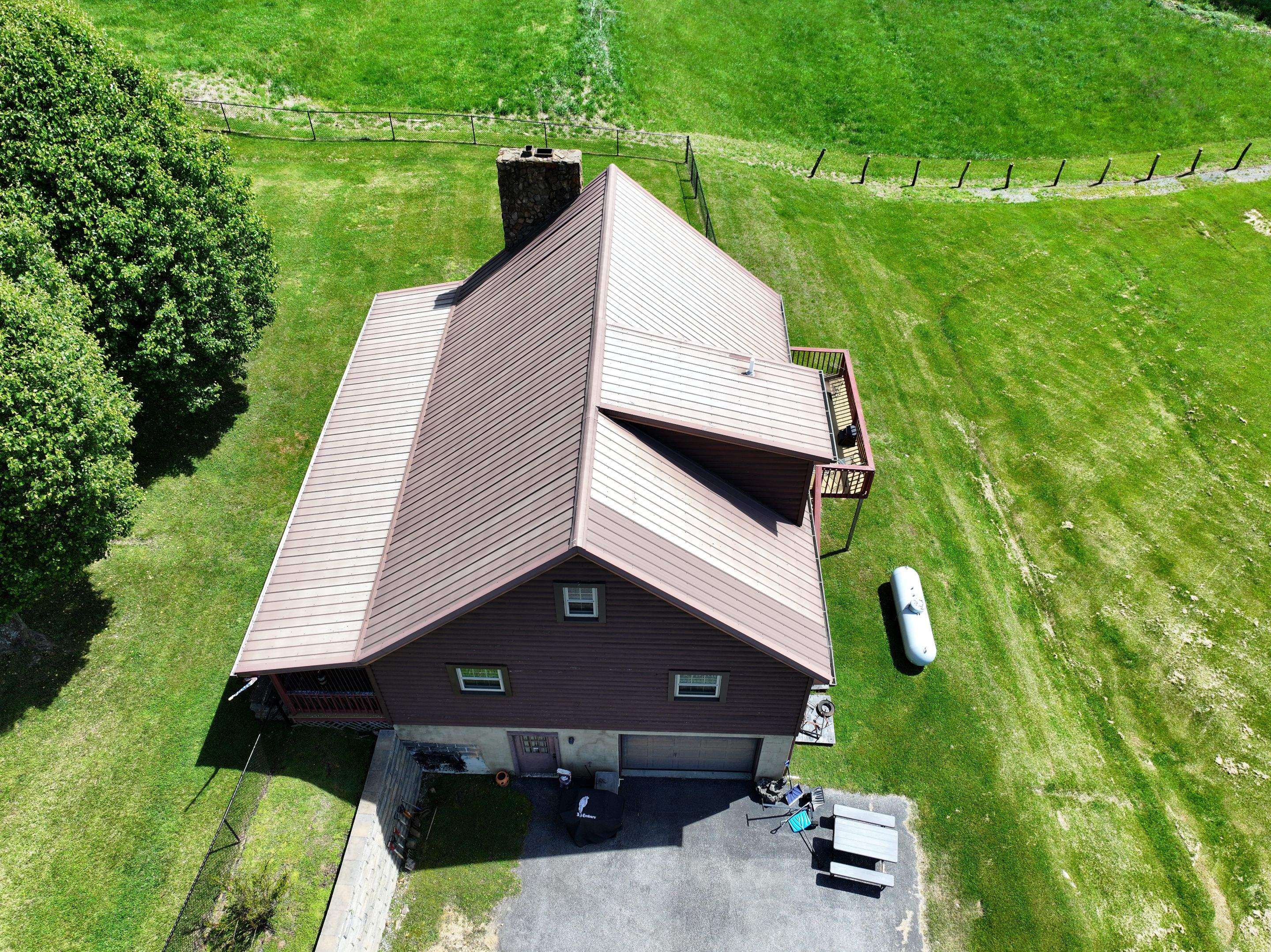 Paddle Creek Pet Ranch Cabin  by Omnia Roofing