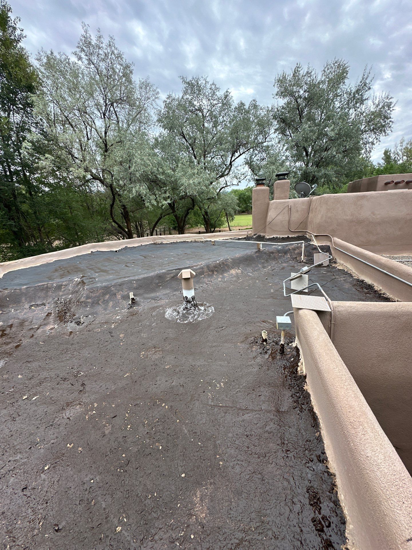 Residential roof application by SPF Services 