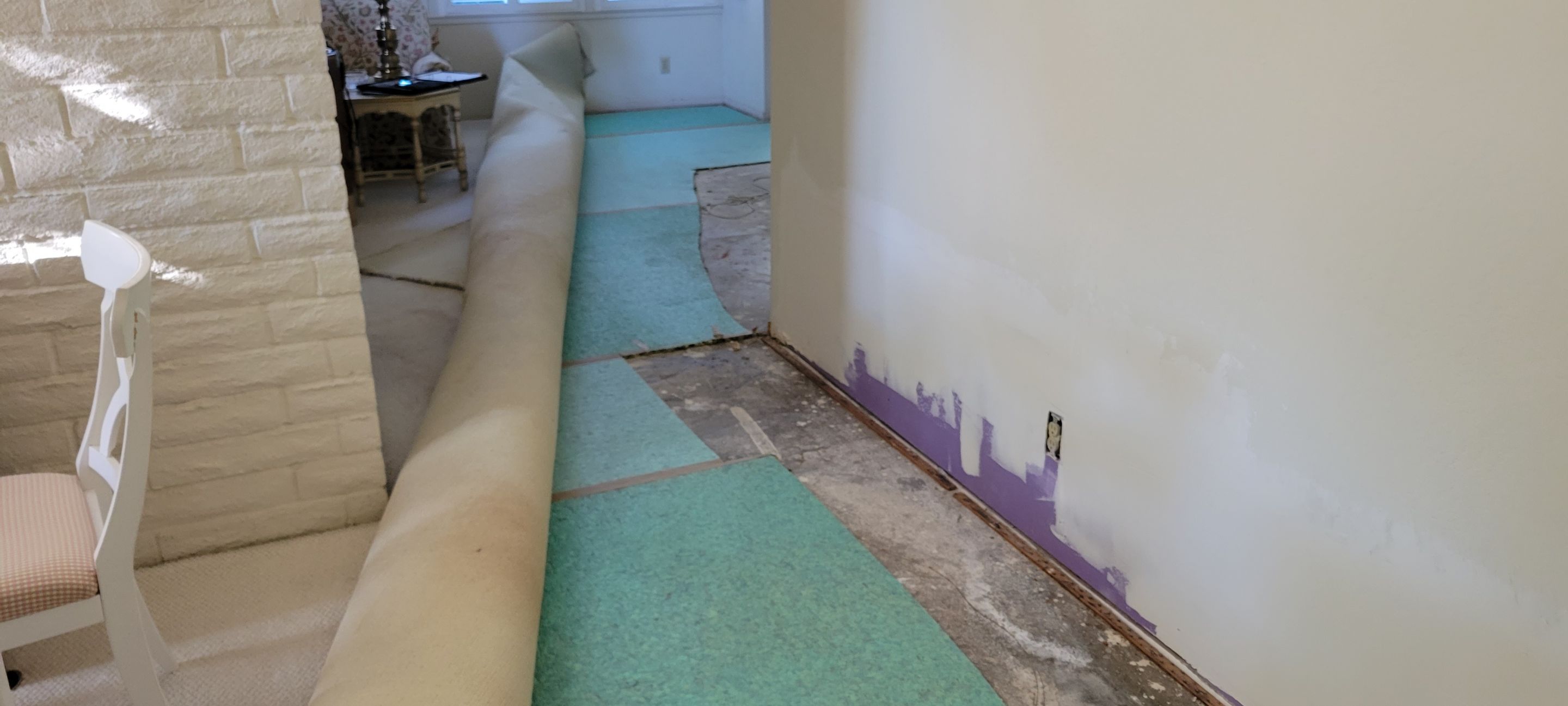 Carpet Re-installation after Flood Damage by Ardent Carpet Restore LLC