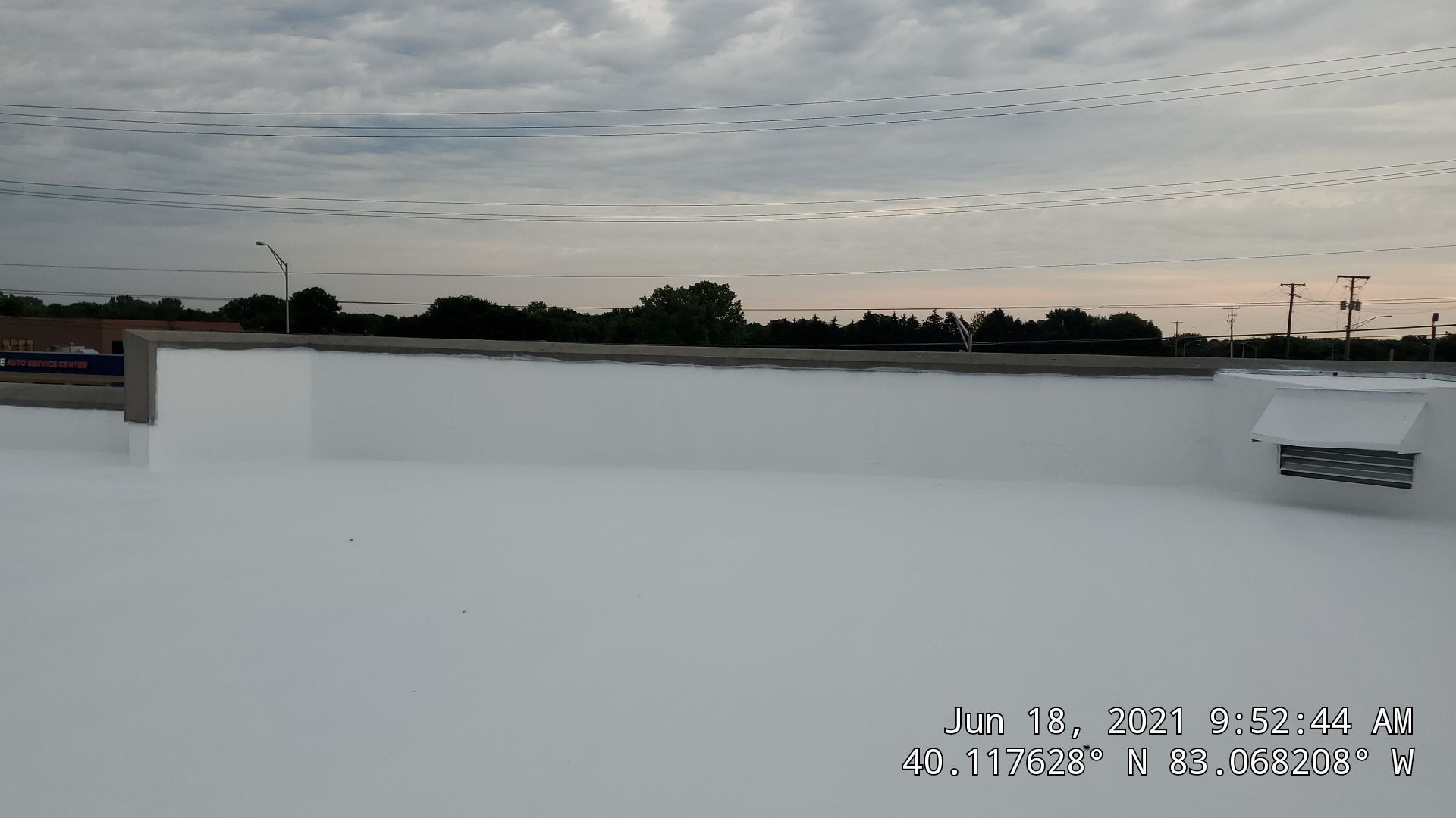 Fabric Reinforced Roof Coating by Gold Star Roofing LLC 