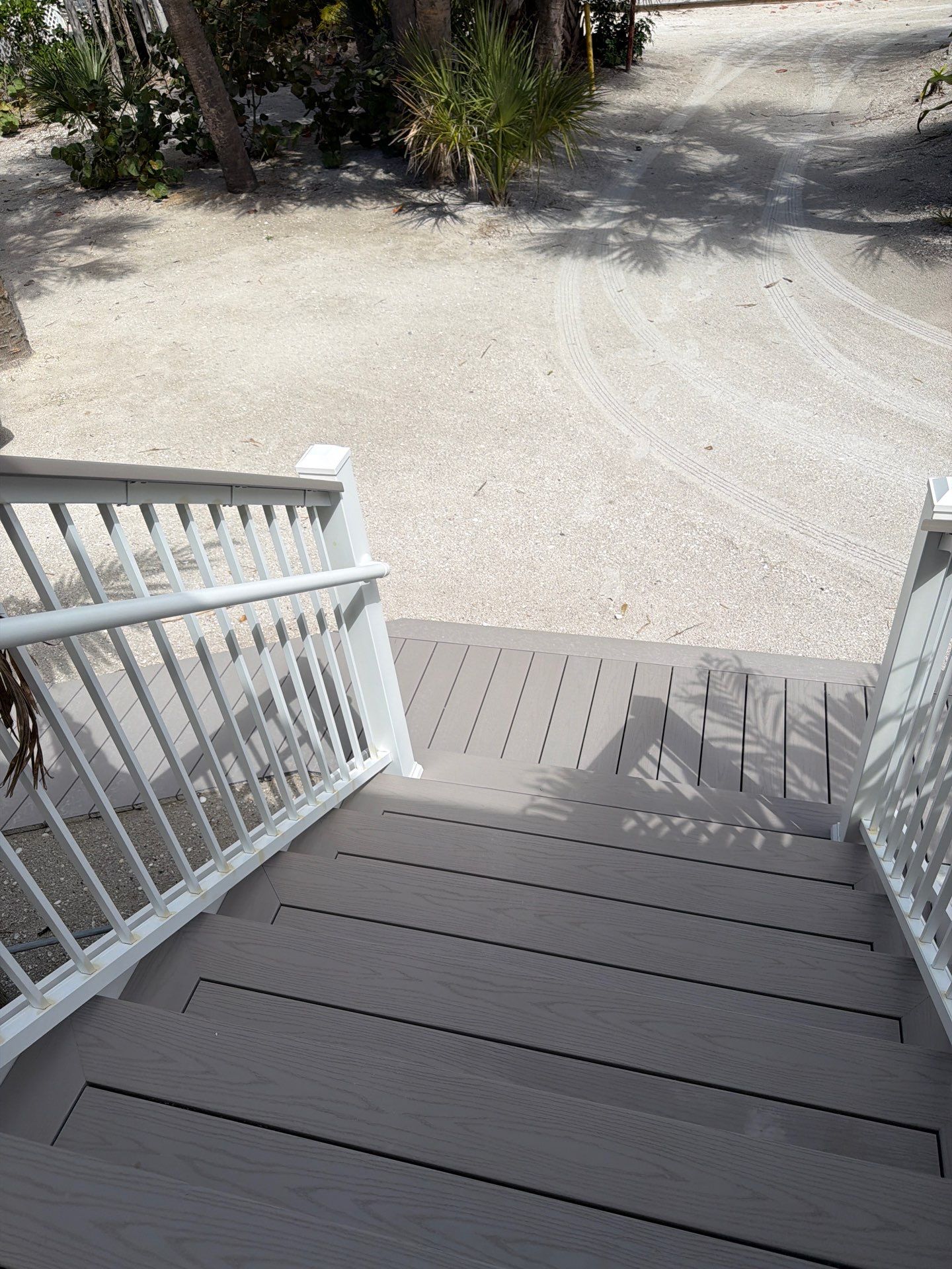 Elevated Deck and Composite Staircase Replacement in Placida Florida by Smirnov Construction Inc
