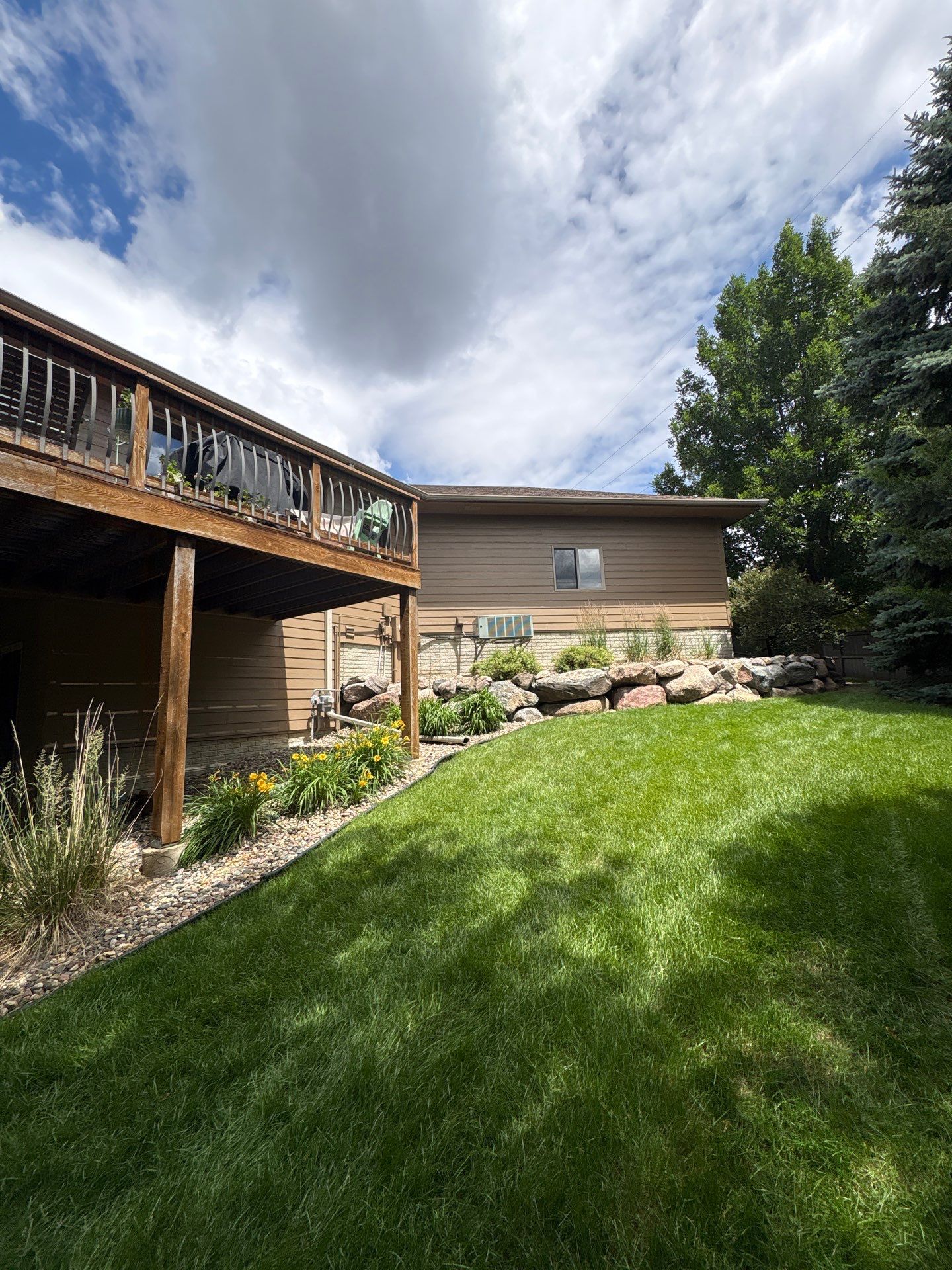 Multi-Story Residential Exterior Painting and Siding Refresh in Sioux Falls by Select Painting, Coatings & Garage Cabinets