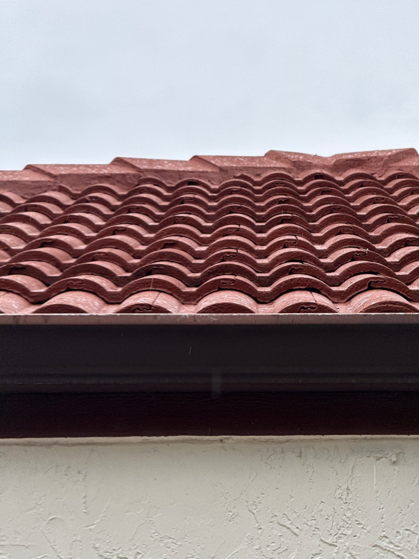 Residential Tile Roof Replacement and Gutter Installation in Winter Park by Pinnacle Roofing Group