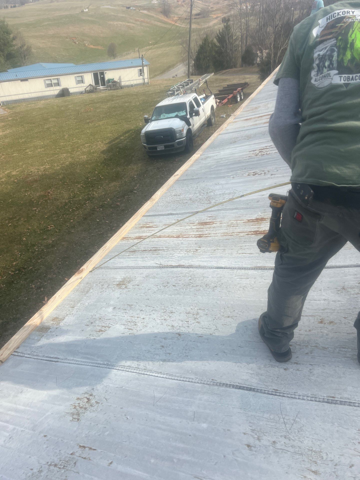 Textured Charcoal Gray using 29 Gauge AG Panel by Omnia Roofing