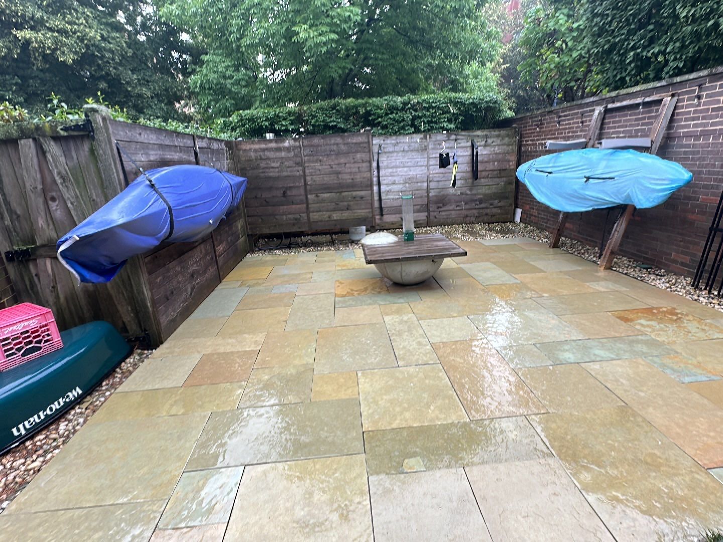 Aggregate and natural stone patio cleaning by Northern Power Washing LLC.