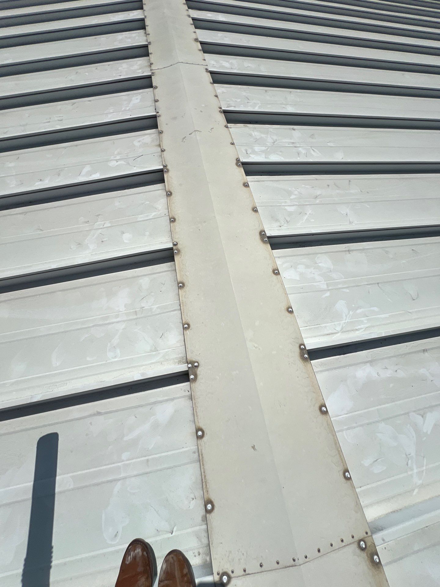 Commercial Roofing Repair using Metal by Roof Repair Company