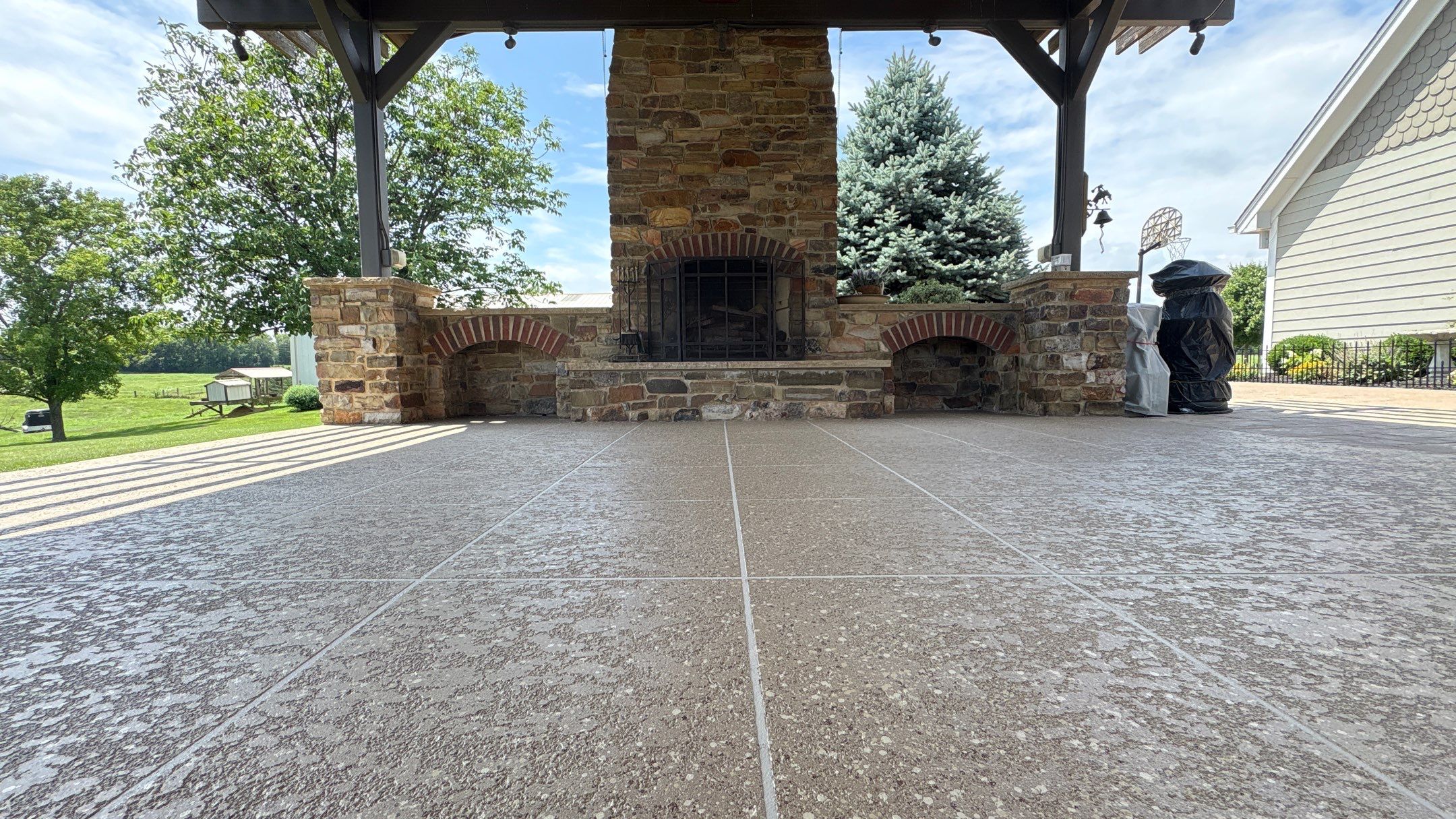 Custom Back Patio Resurface - Kearney, MO by Big Red Decorative Concrete, LLC