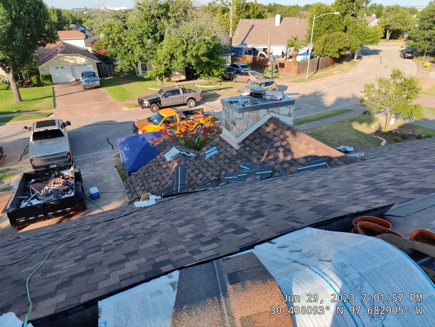 New Roof Installation Of IKO Dynasty Color Brownstone by DeZign Roofing & Exteriors