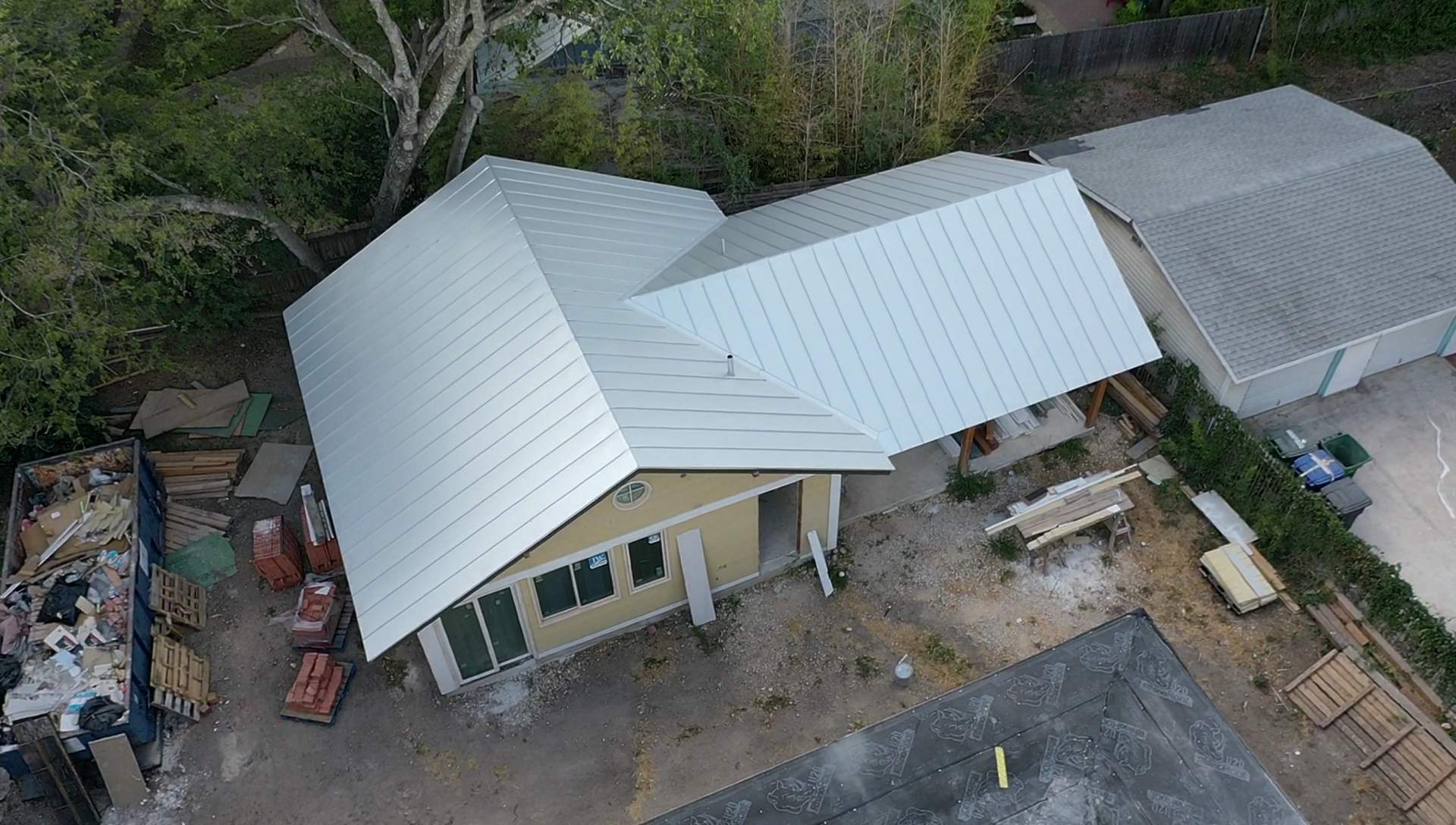 Residential Metal Roof Installation using McElroy Metal by Premier Roofing and Contracting