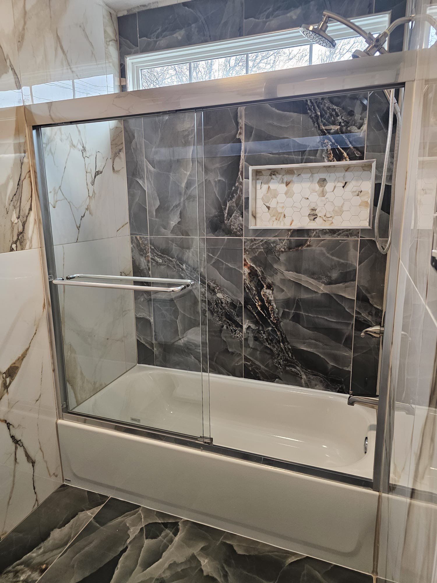 Luxury Bathroom  by Blue Handyman   LLC