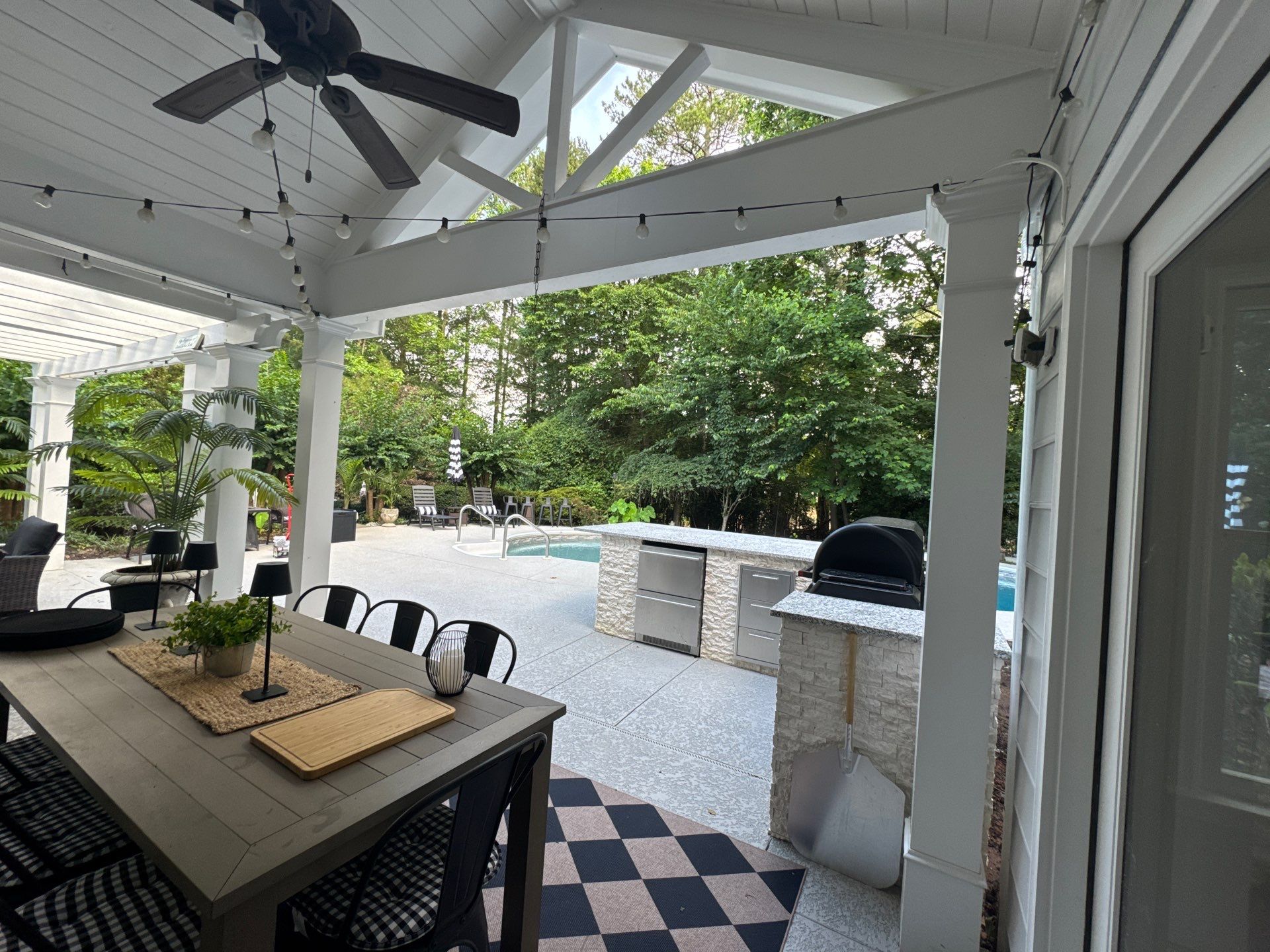 Marietta Poolside Pavilion with Custom Outdoor Kitchen and Pergola by Swift Home Renovations