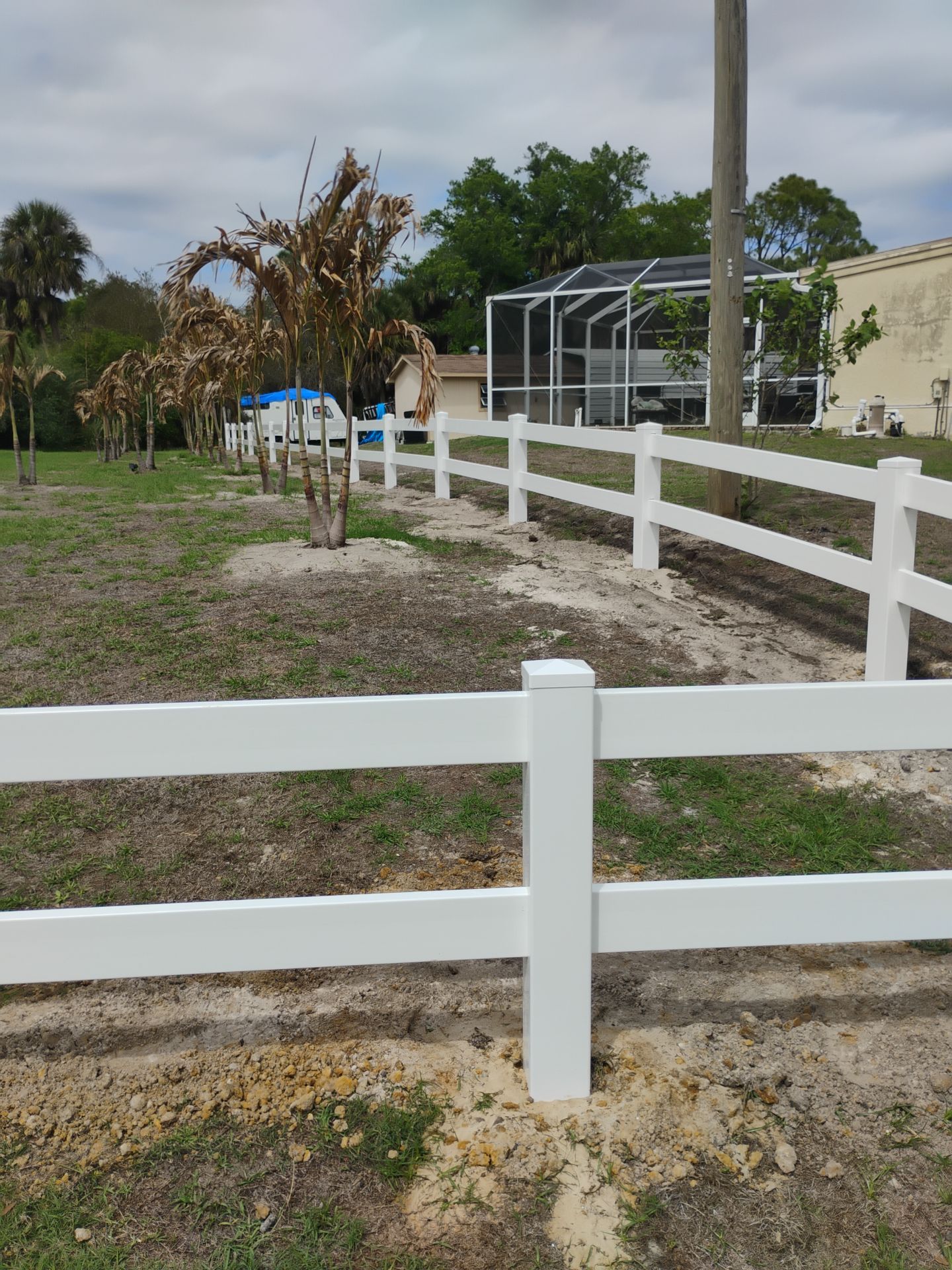 Vinyl Ranch Rail in North Port by True Fence LLC