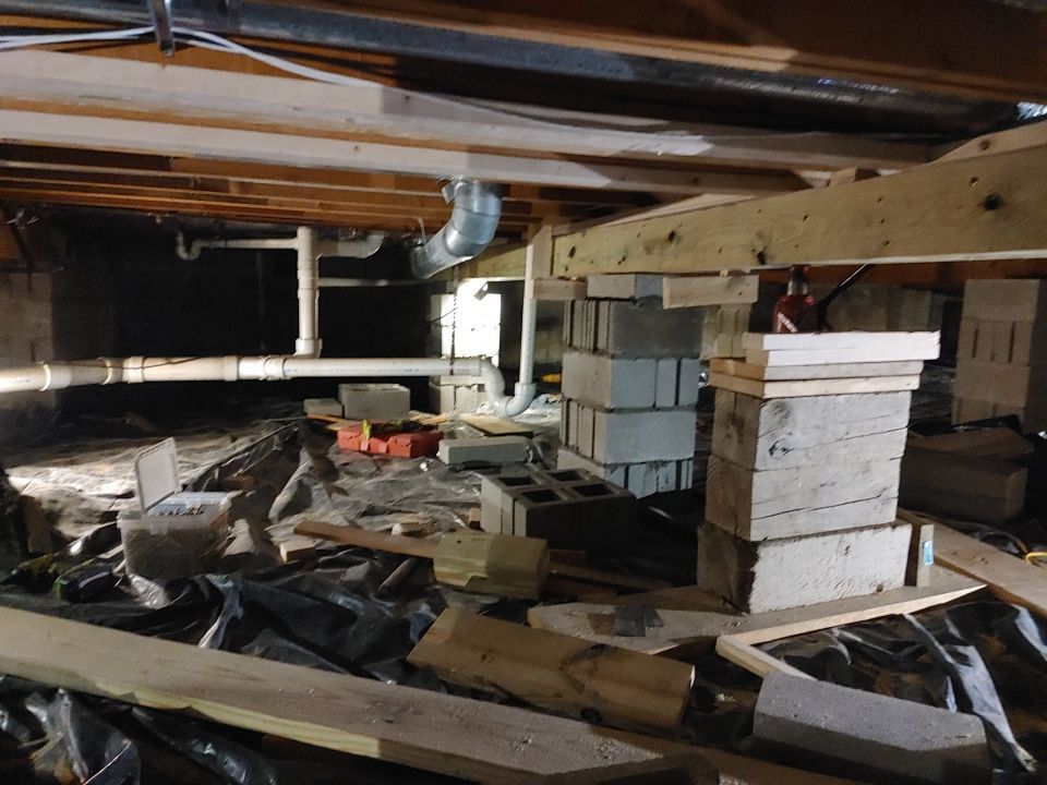 Crawl space encapsulation and Waterproofing using Structural Wood and Steel Reinforcements by Toledo Basement Repair 