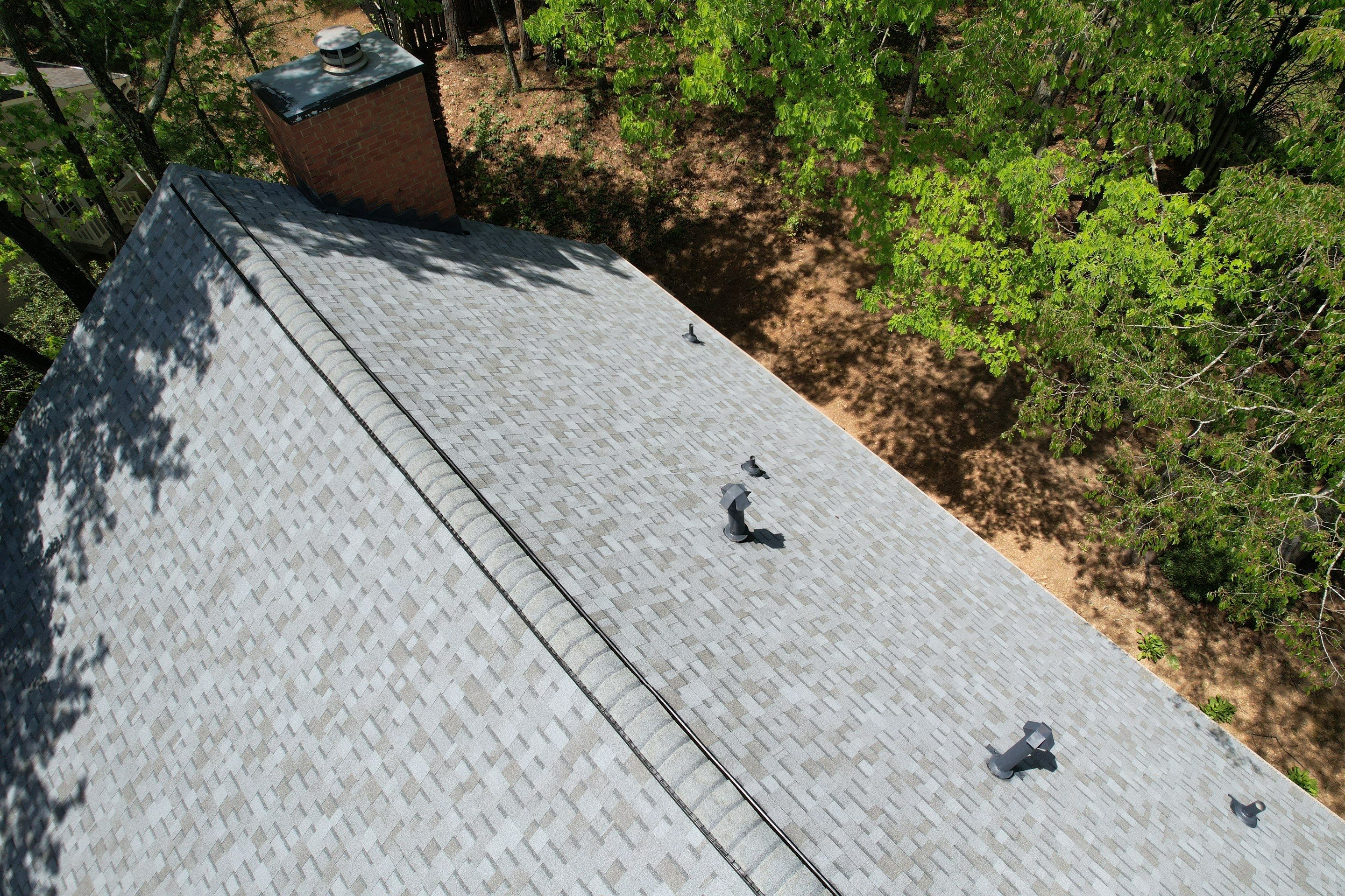 Residential Roofing Installation using Owens Corning Quary Gray by Inspector Roofing and Restoration