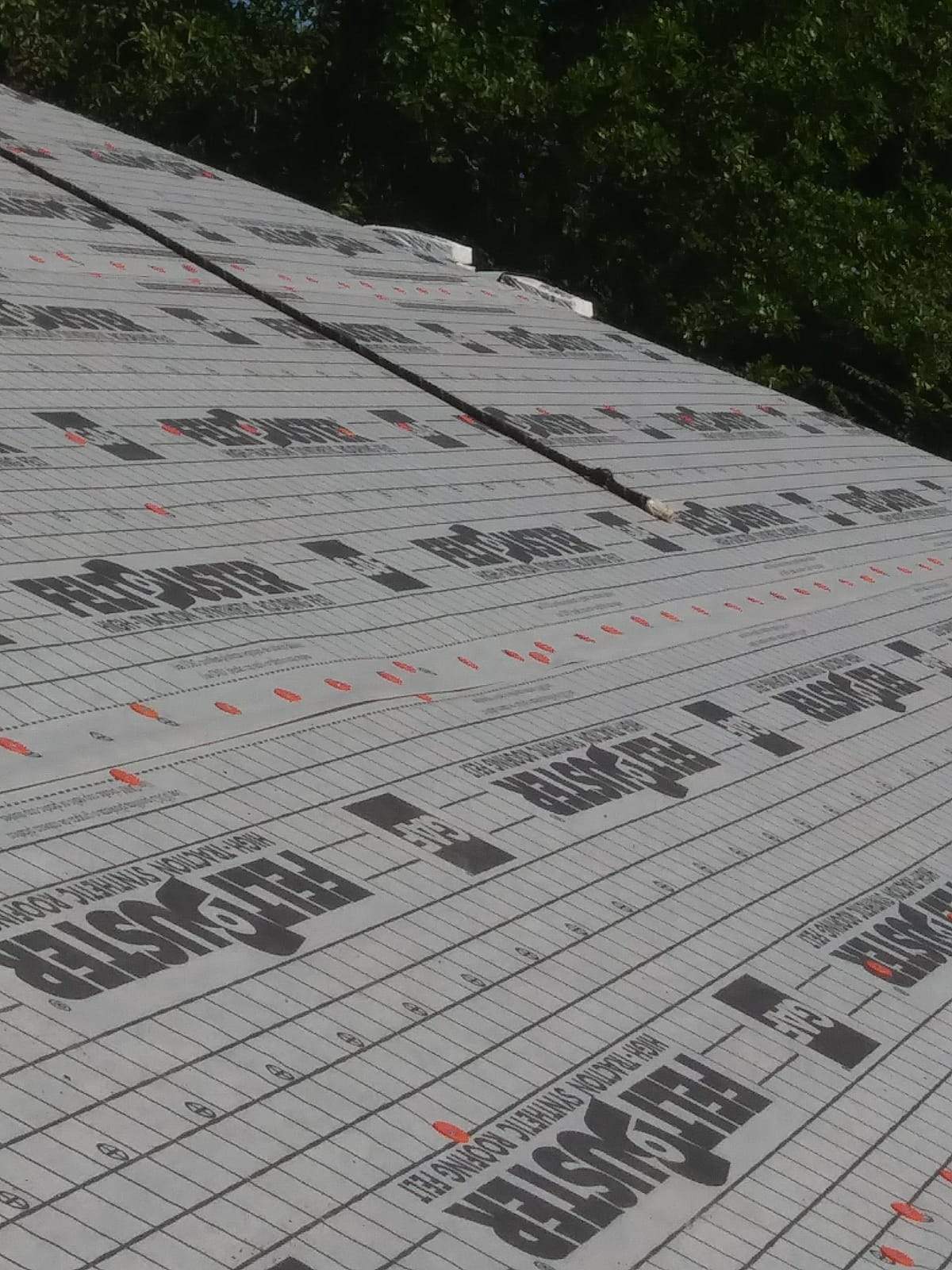 Residential Roofing Installation using Roof Replacement by American Roofing & Construction LLC