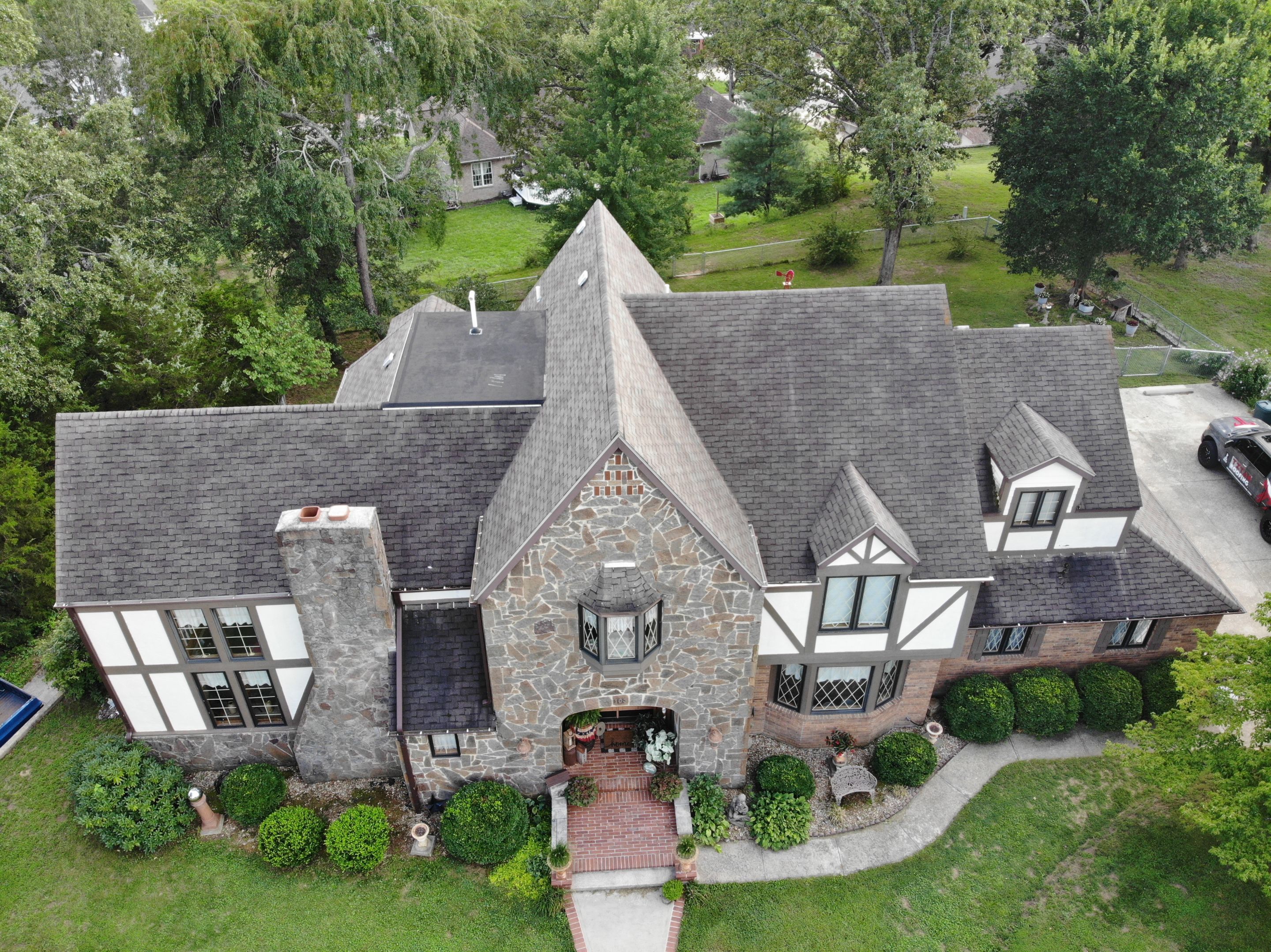 Residential Roof + Gutters & Downspouts & Gutter Guards Install  by Titan Commercial & Residential Roofing 