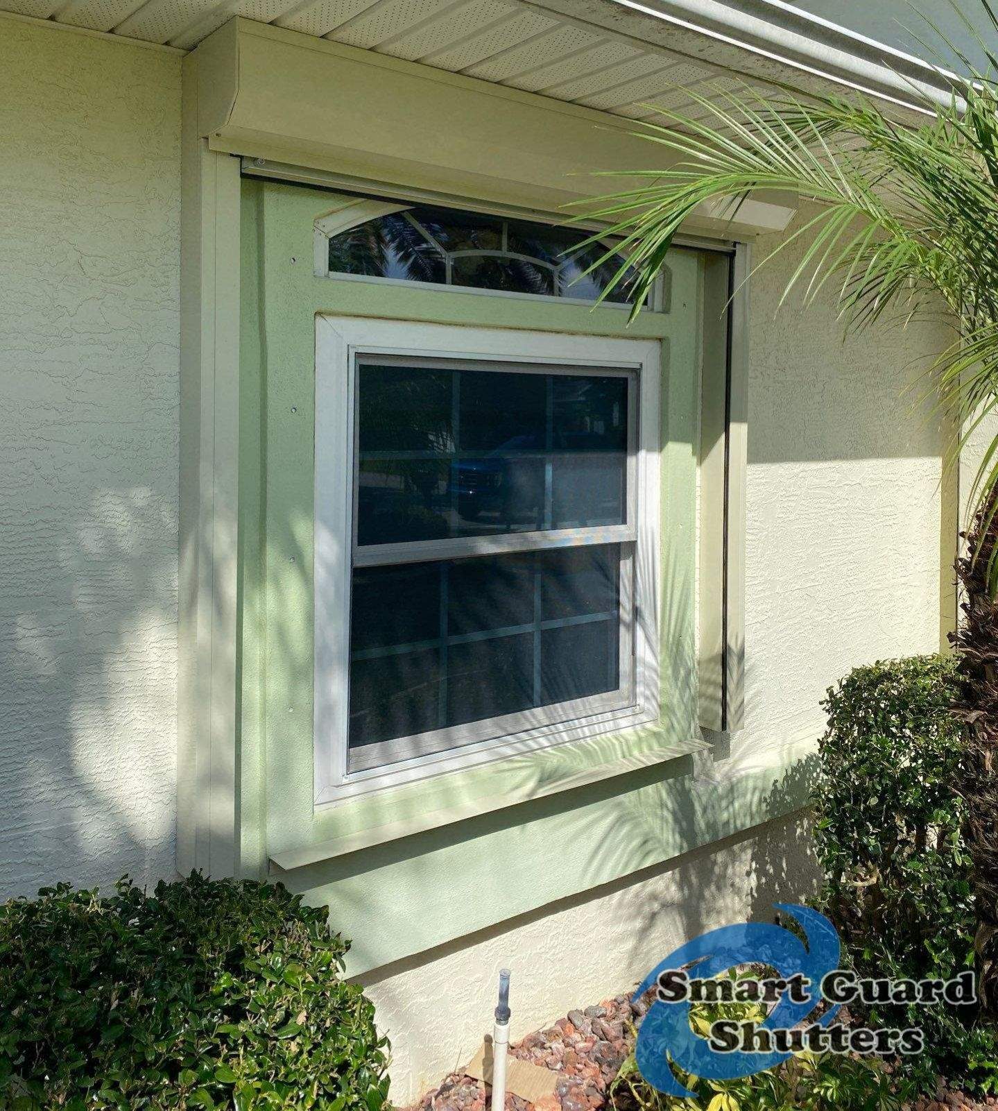 Rolling Shutters in Ivory by Smart Guard Shutters