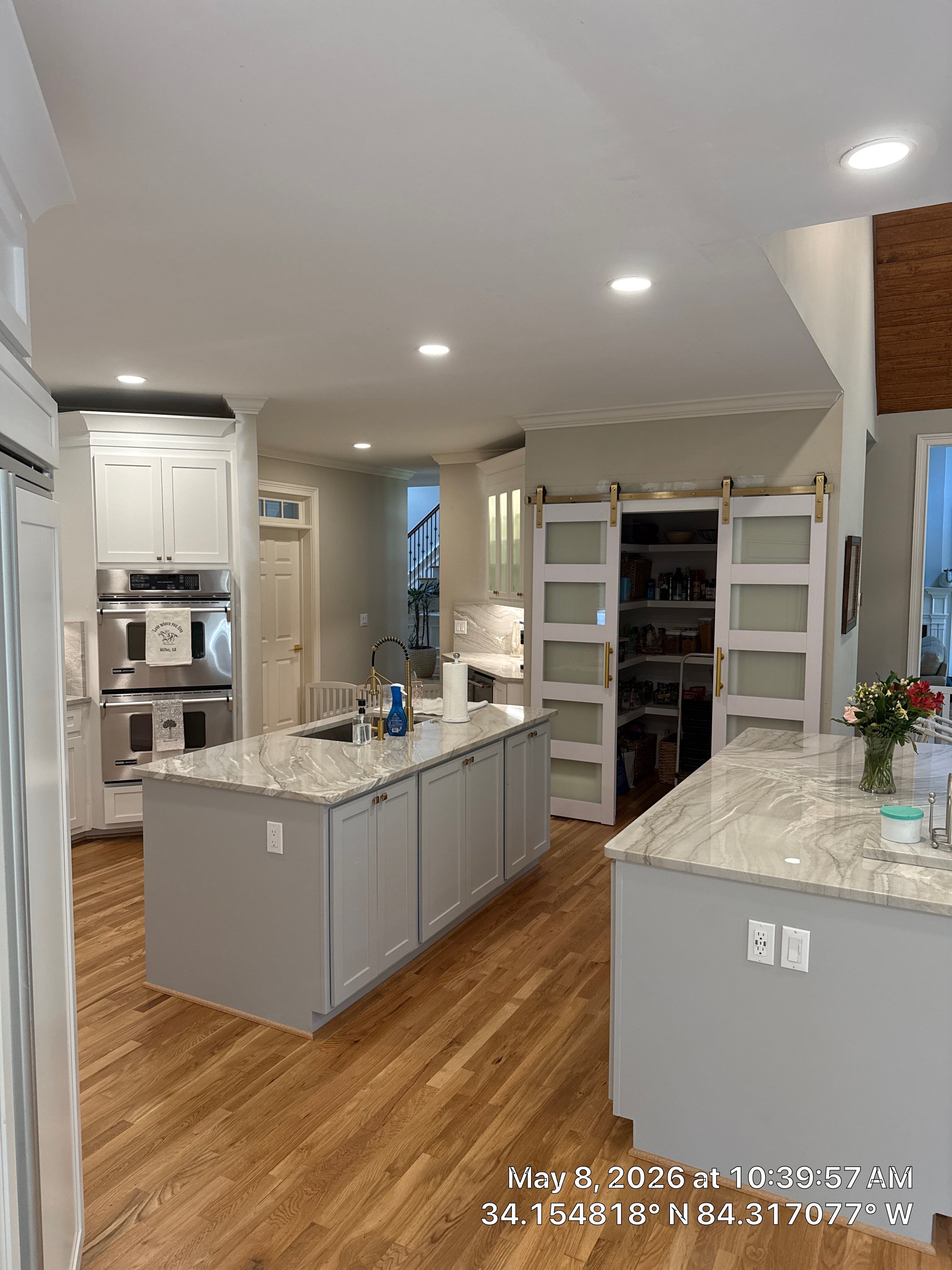 Alpharetta Kitchen Remodel Featuring Double Islands and White Quartz by Heart & Home Kitchen & Bath Remodeling LLC