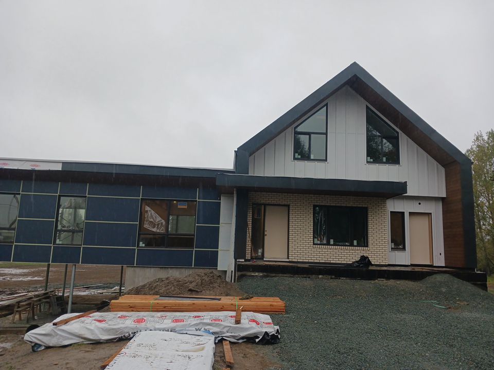 Residential Roofing Installation using multiple products by Top Notch Roofing Inc