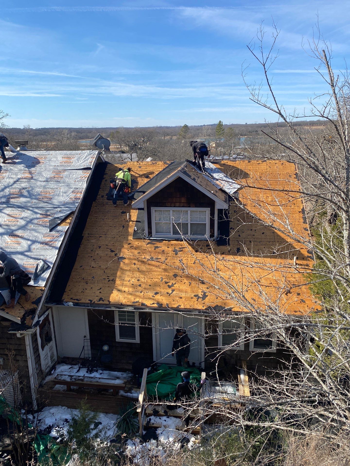Roof Replacement on a private lake near Ardmore by BANA Roofing and Solar Supply