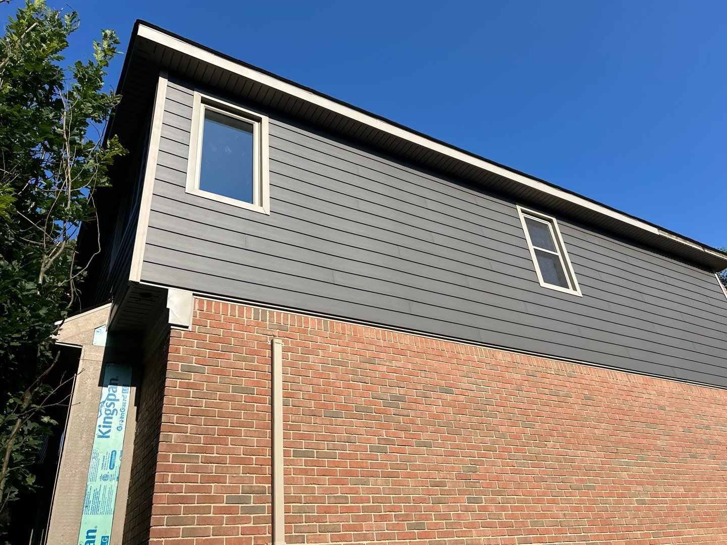 Roof Replacement using Owens Corning Peppercorn and Siding Replacement using Ascend Charcoal Smoke by 180 Contractors