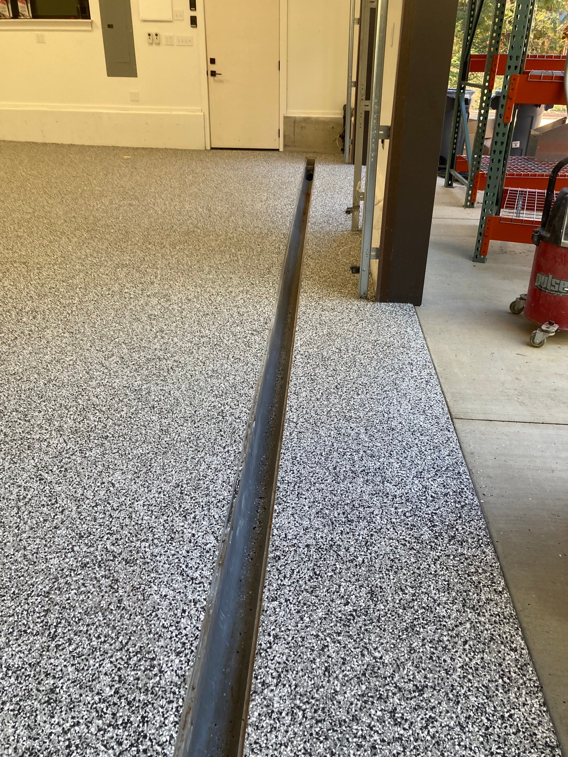 Garage Transformation using Domino and the Penntek Evolution System by Croc Coatings, LLC