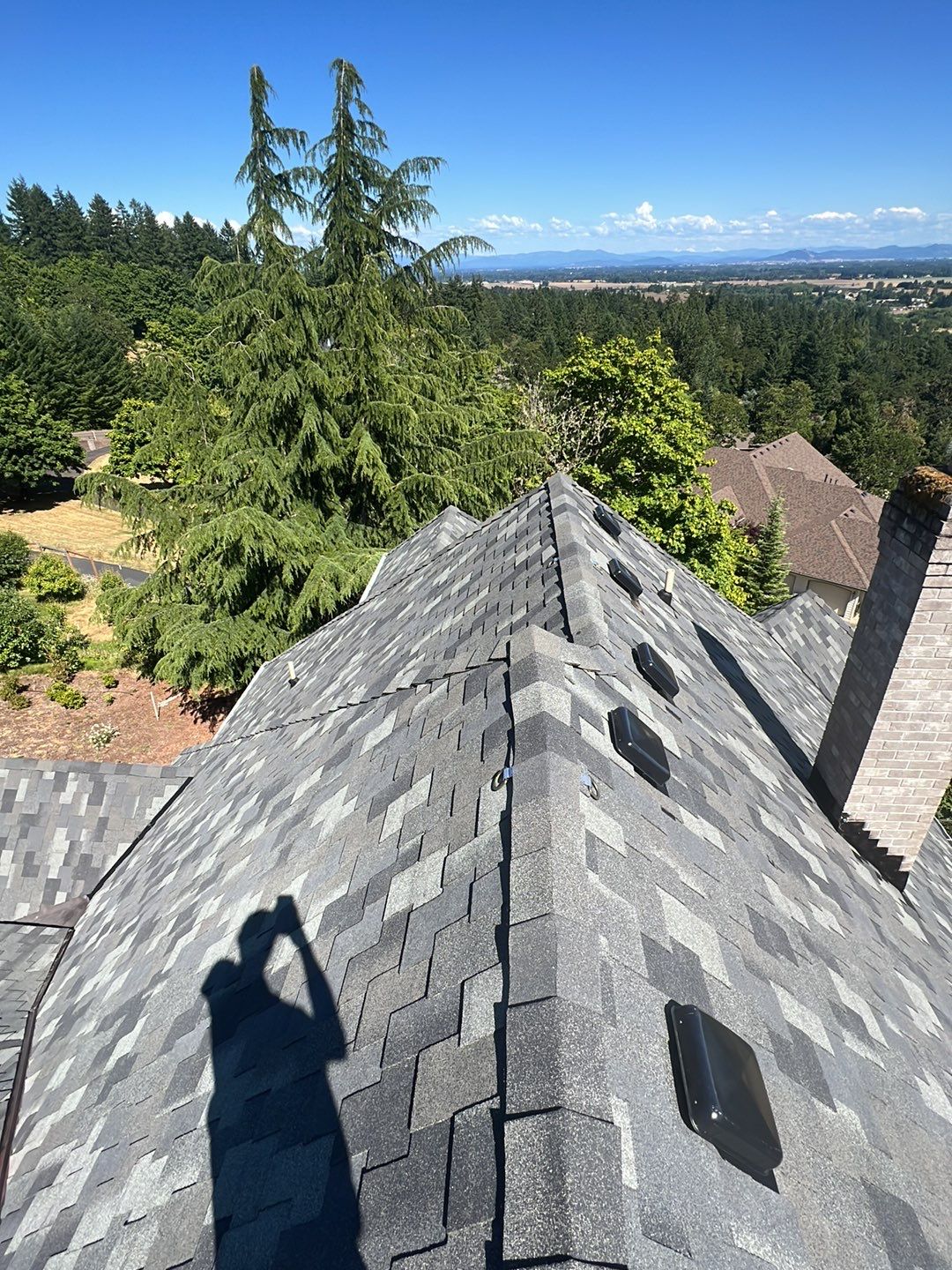 Residential Roofing Installation using Malarkey Windsor 50 Year Shingle (Color: Storm Grey) by Orezona Building & Roofing Company, Inc.