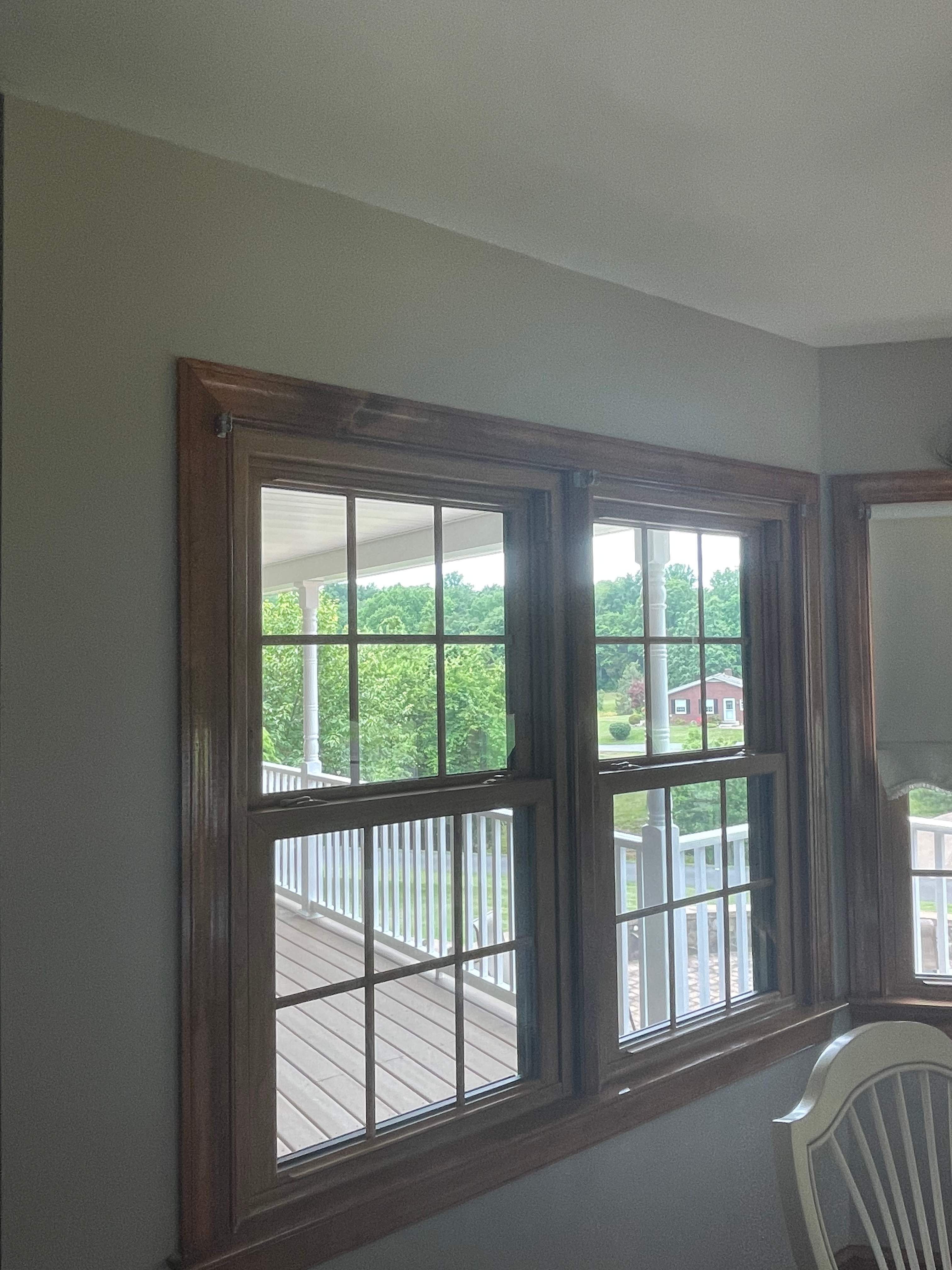 Exterior remodel including window replacement by American Home Contractors