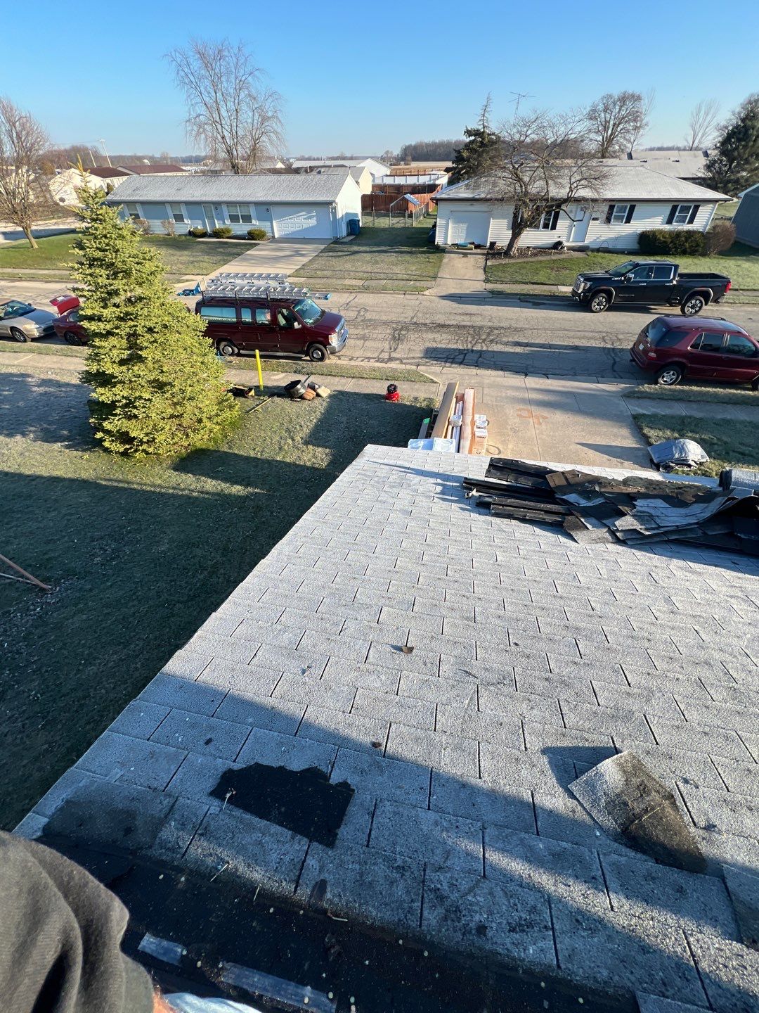 Storm Damage Residential Roof and Siding Installation by WIW Enterprises Inc