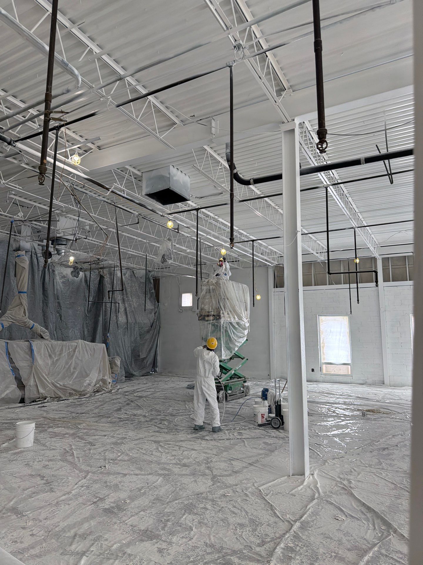 Industrial Warehouse Fire Damage Cleaning and Spray Sealing in Islandia by EMS Restoration Corp