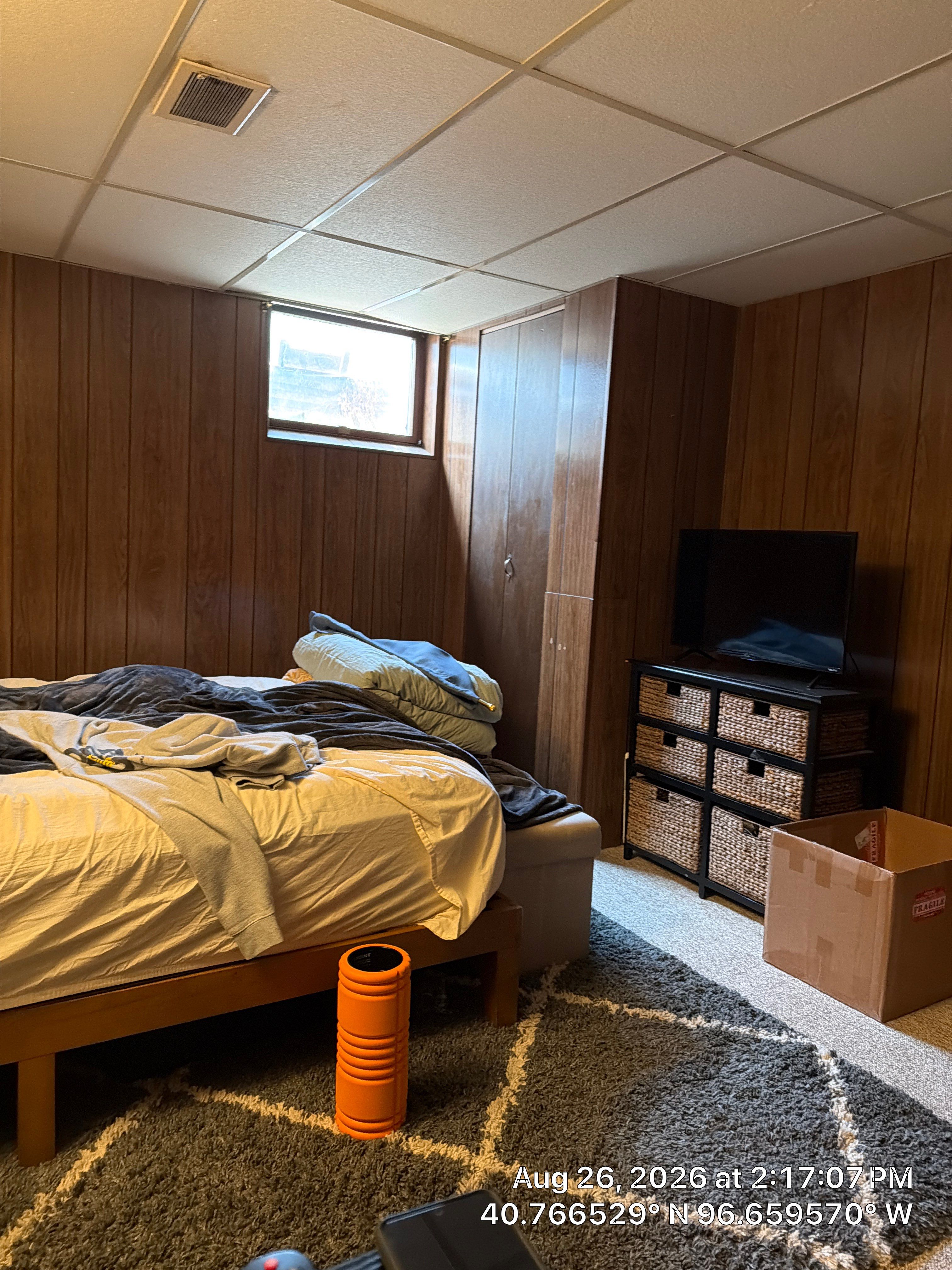 Basement Bedroom Interior Assessment and Ceiling Repair in Lincoln by CompanyCam Sales Demo