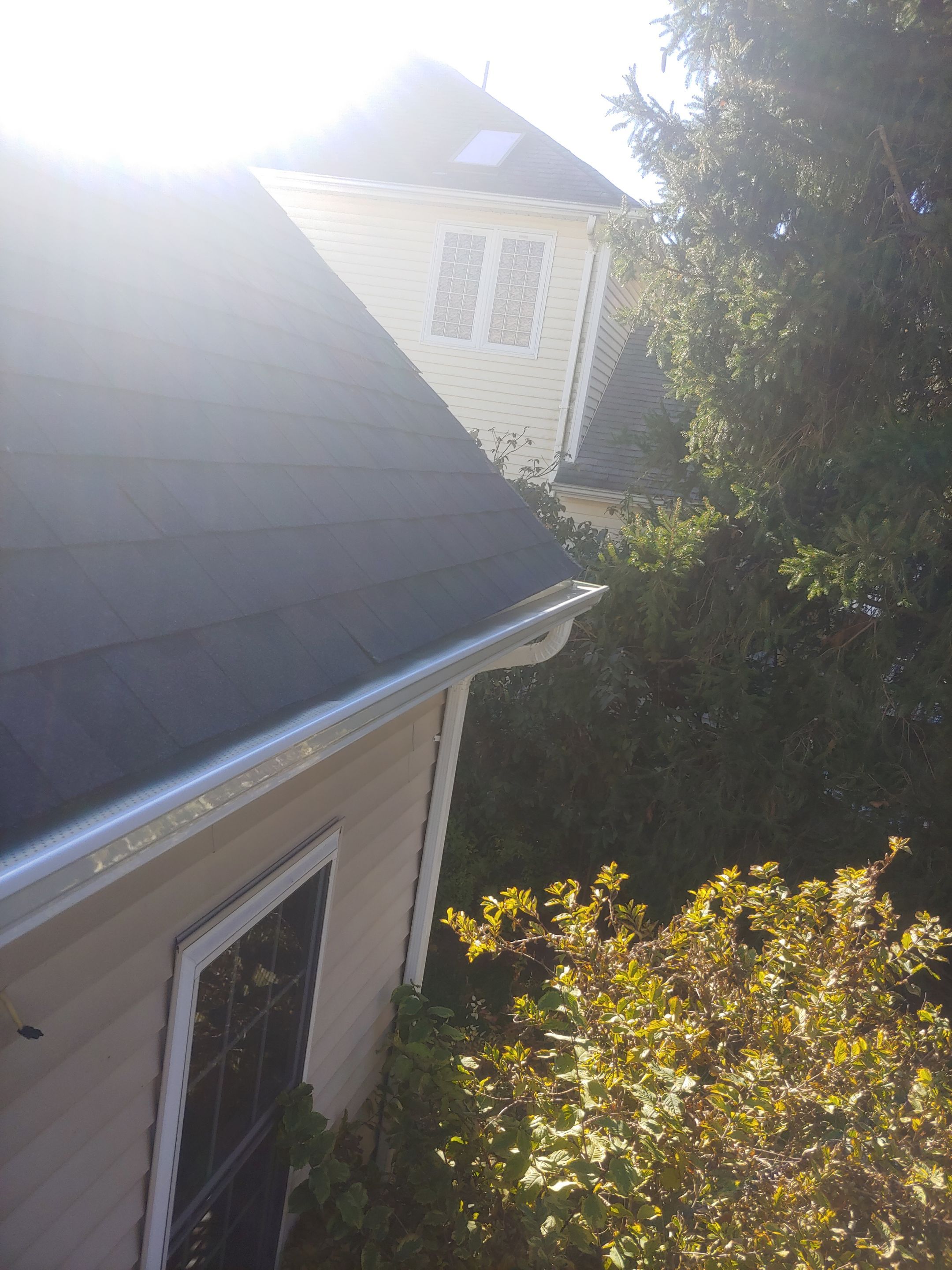 Residential Roofing Installation using Certainteed Landmark Moire Black by A Plus Exterior