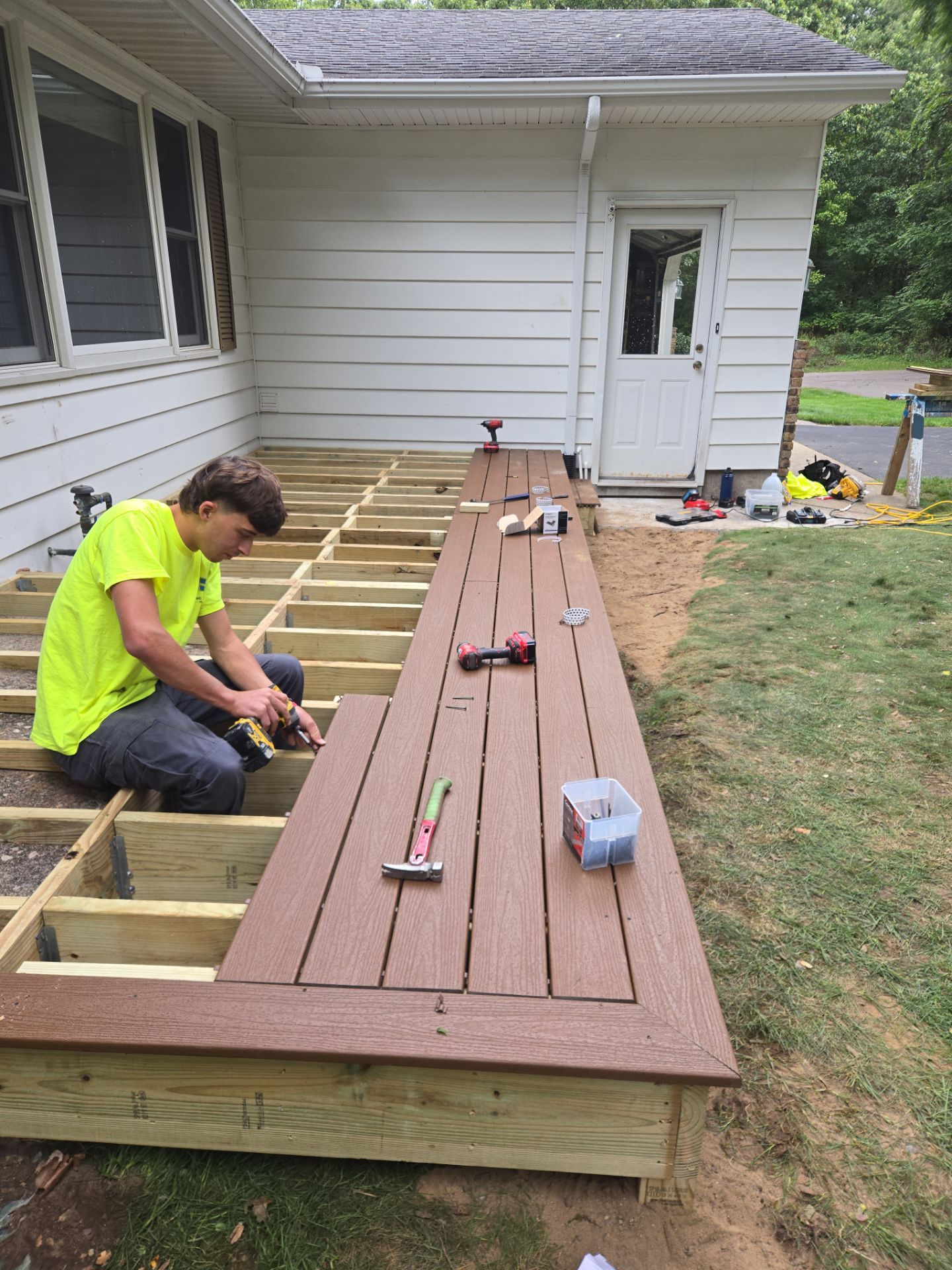 Exterior Remodel & Custom Deck by Cutting Edge Homes