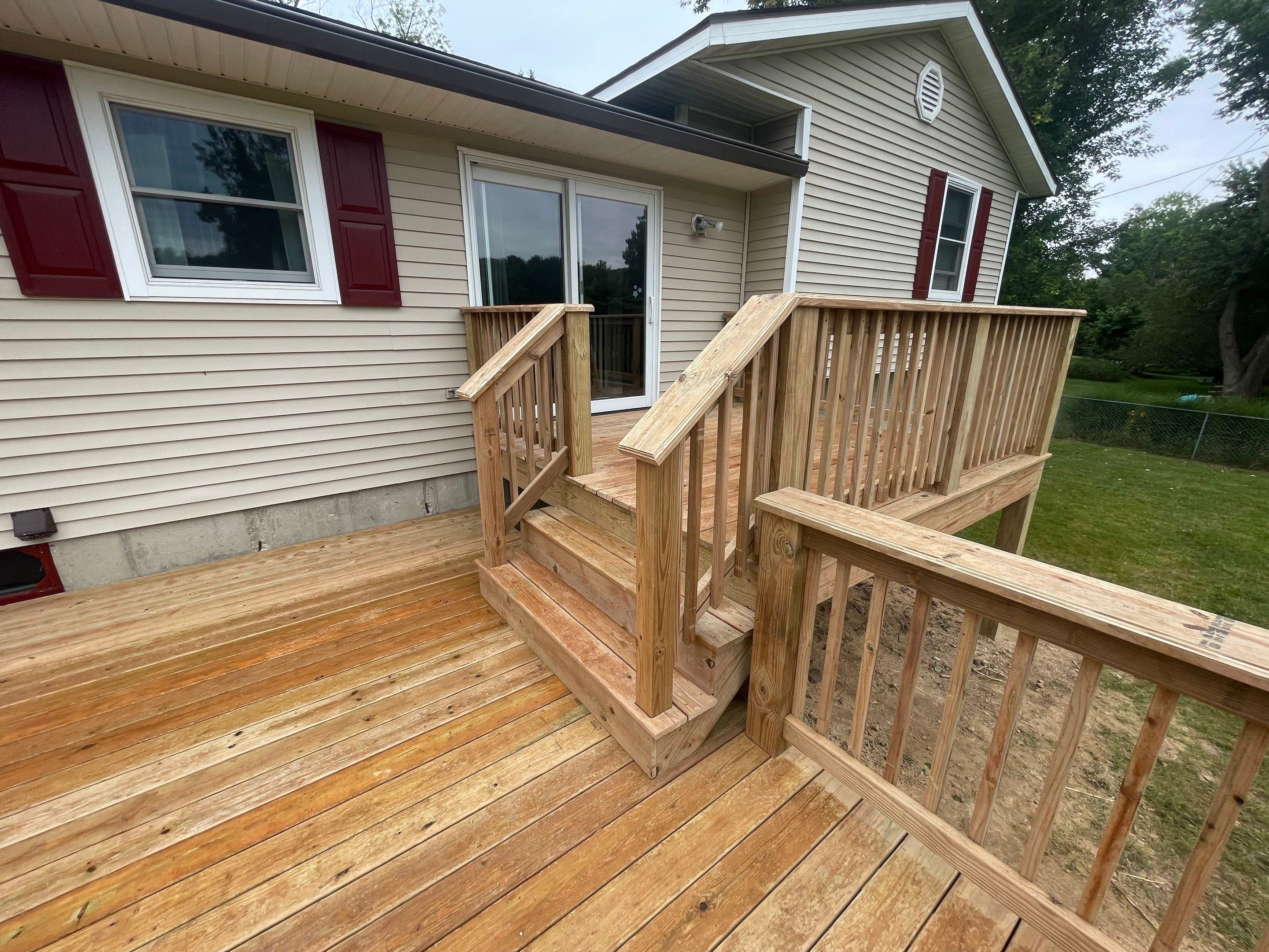 Deck Installation using Treated Lumber by Avalon Roofing and Exteriors