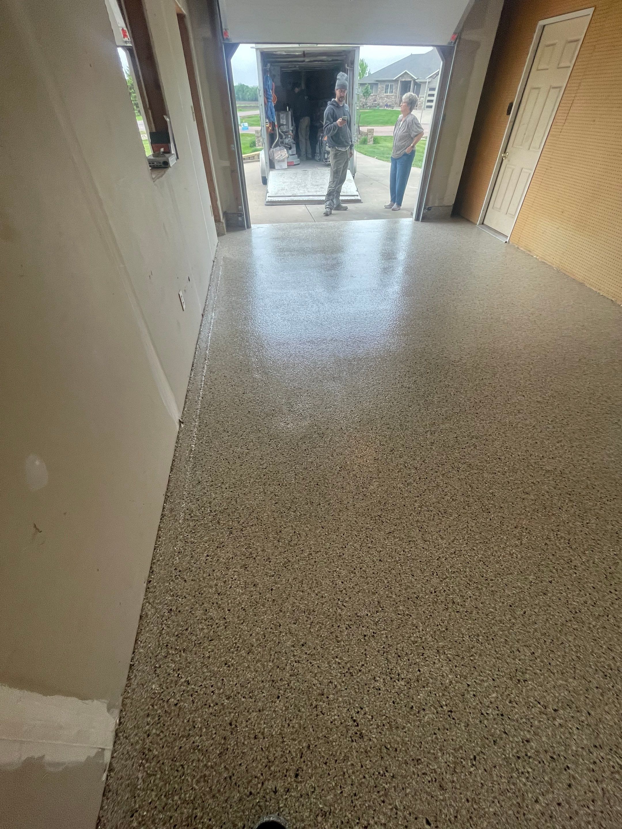Speckled Epoxy Floor Coating Installation for Centerville Residential Garage by Select Painting, Coatings & Garage Cabinets