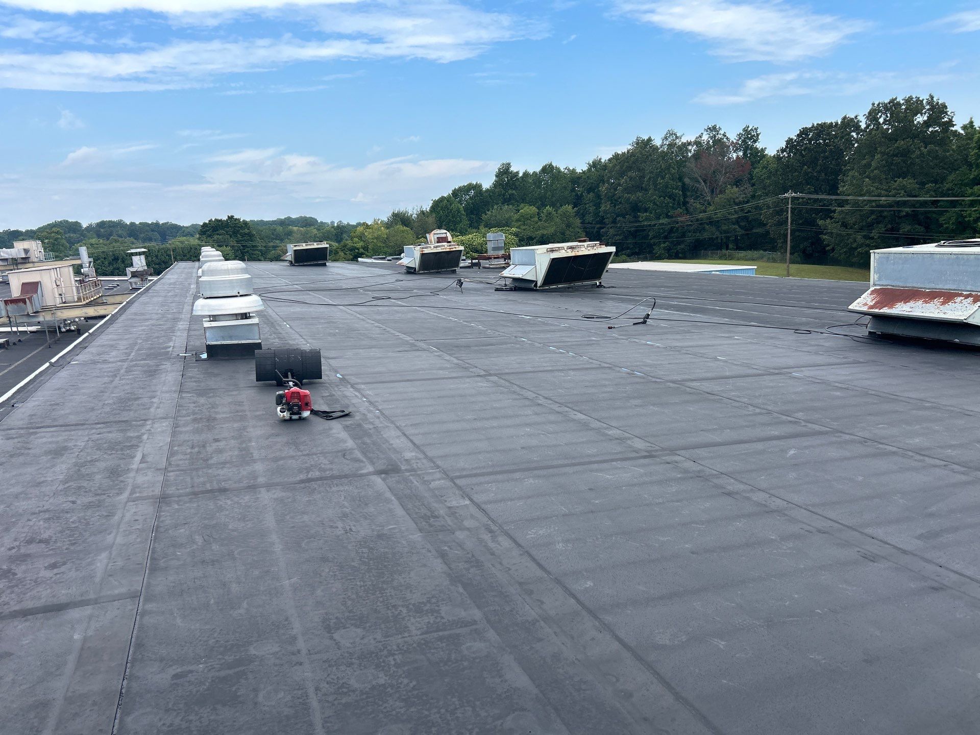 Commercial Roofing Installation using Coatings by Kentucky Commercial Roofing