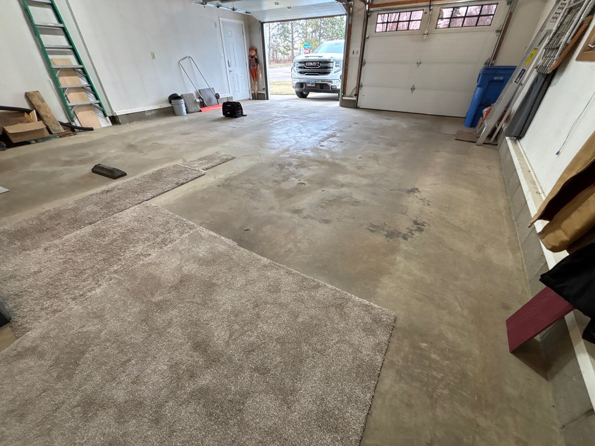 Madison Garage Concrete Coating with Feather Grey Speckle Finish by Select Painting, Coatings & Garage Cabinets